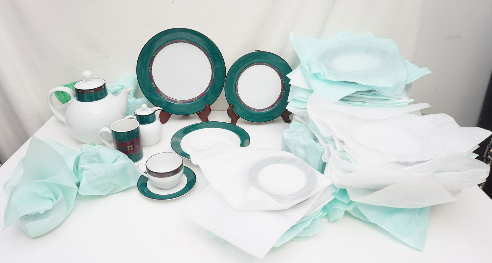 52 PC DANSK EMERALD BRAID DINNERWARE: 52 Piece Service for 8 Plus Extras. Dansk Quiltings, Emerald Braid. 10 Dinner Plates 11", 10 Salad Plates 9". 9 Rim Soup Bowls 8 3/4". 10 Saucers and 9 Teacups, Creamer, 2 Mugs and 1 Tea / Coffee Pot