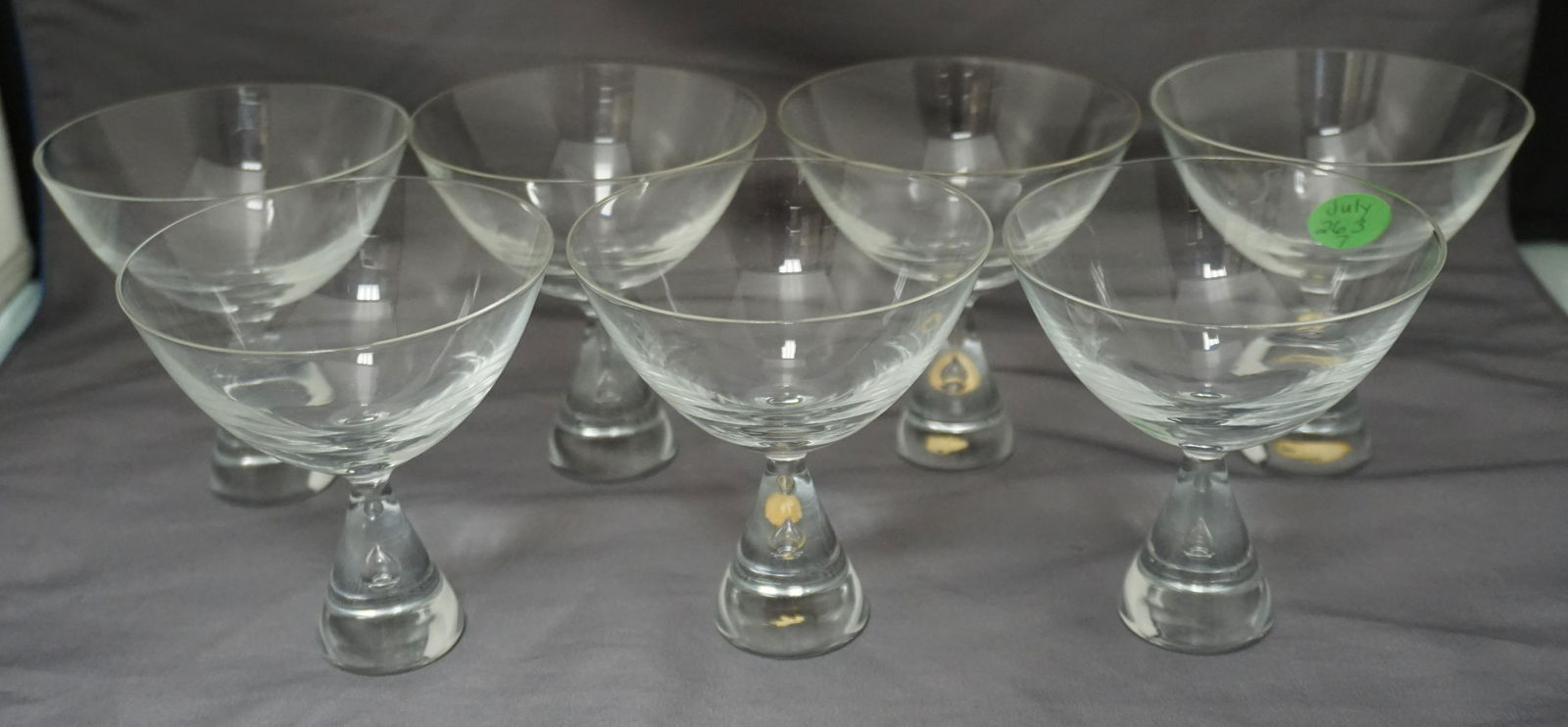 7 DANISH MCM HOLMEGAARD PRINCESS CHAMPAGNES: Seven (7) Vintage MCM Holmegaard Danish Crystal Champagnes in the "Princess" Pattern. Air Bubble in Stem. Each 3 3/4". Weight combined 2 pds. PROVENANCE: A Charleston SC Private Estate.
