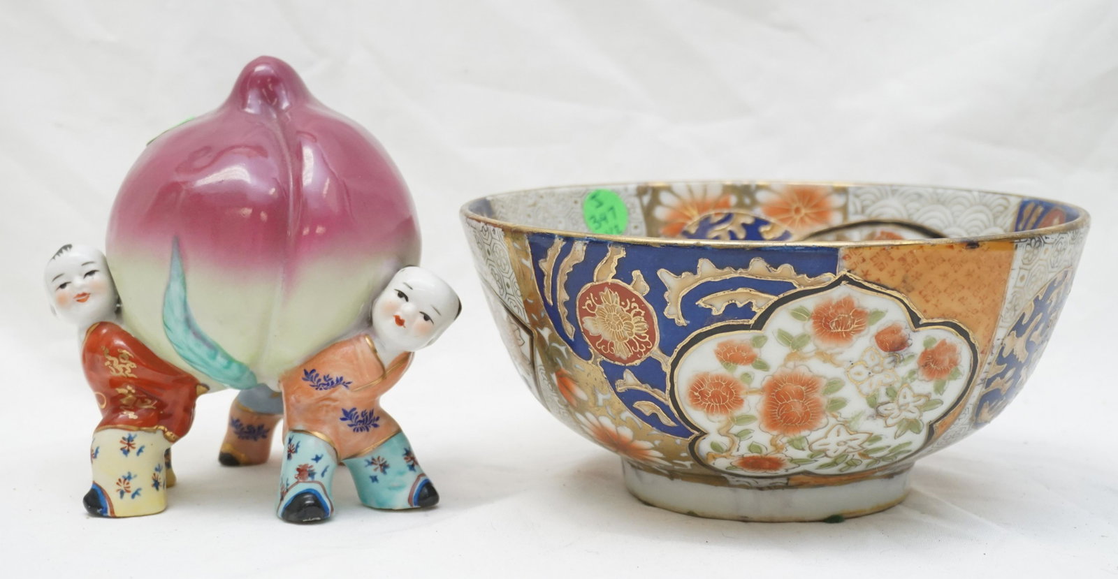2 CHINESE PORCELAIN BOWL & POMEGRANATE BOYS: 20th c. Hand Painted Chinese Porcelain Bowl with Gilt Accents 8"x8"x3 1/2". Chinese Children with Pomegranate. The pomegranate is considered a symbol of fertility and therefore it is often represented