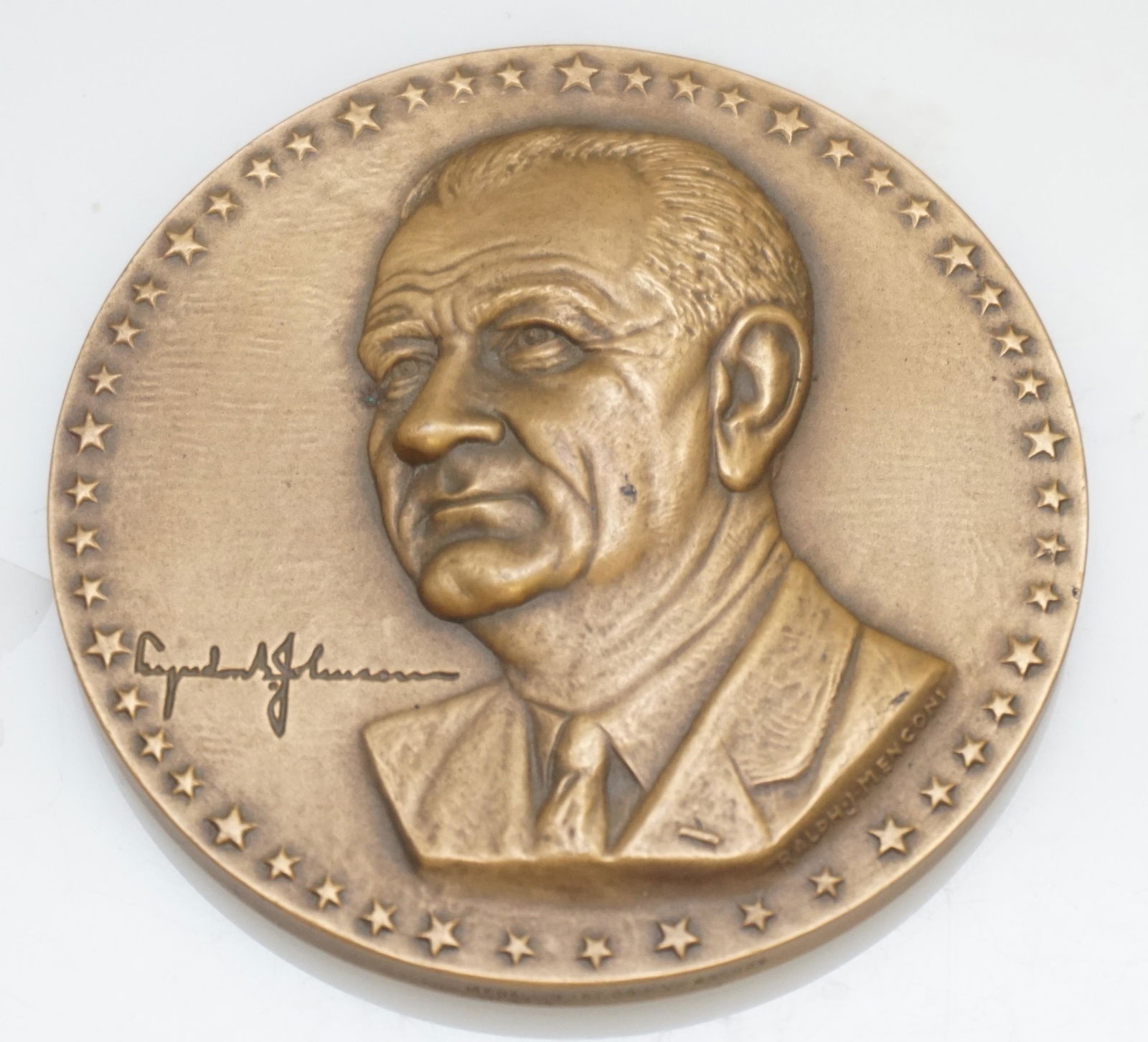 BRONZE LYNDON B JOHNSON MEDALLION: Bronze Medallion Commemorating President Lyndon Johnson's Asian-Pacific Visit, 1966, The obverse features a high-relief bust of President Johnson with his signature to the left, surrounded by 50 stars