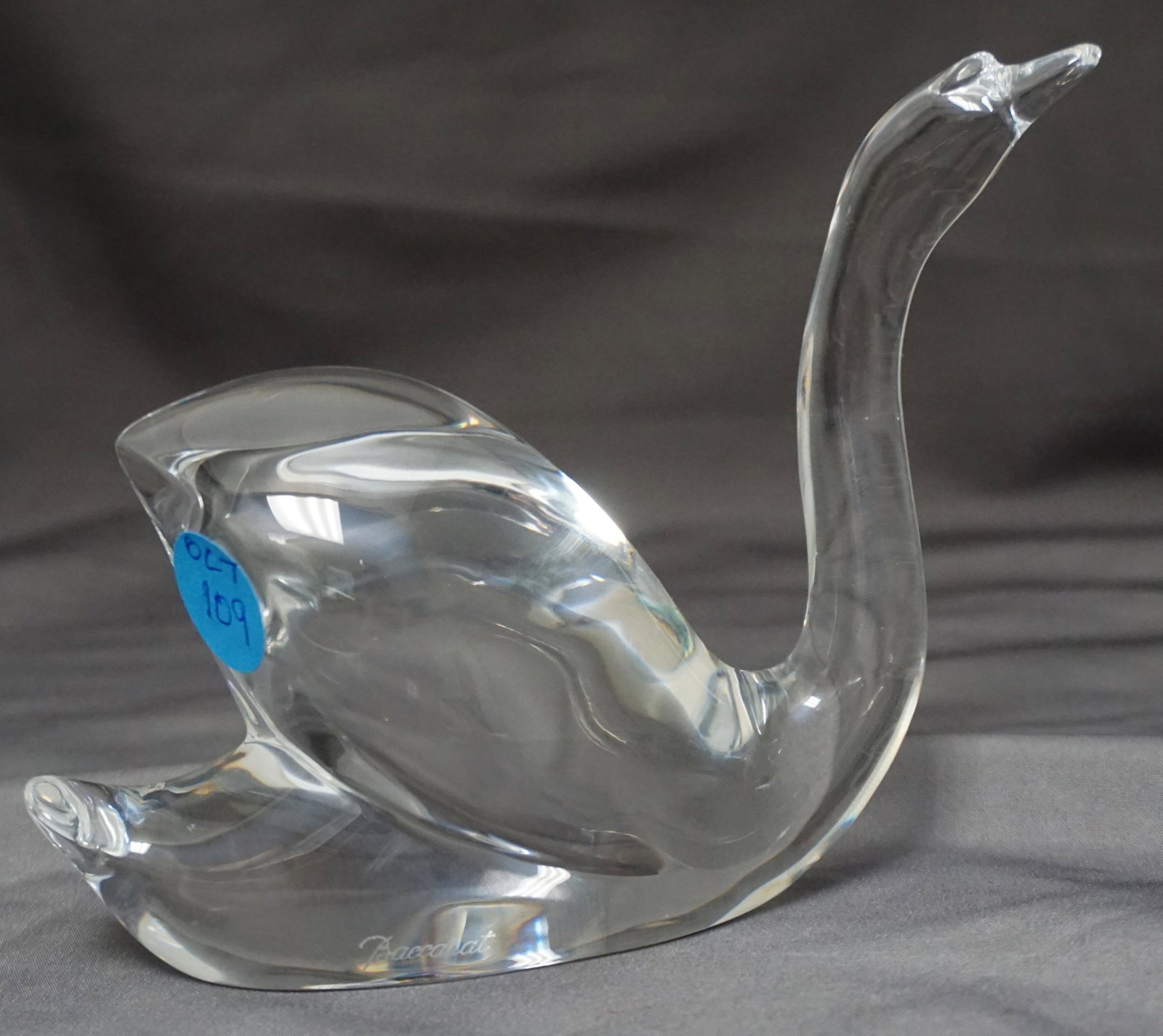 BACCARAT CRYSTAL SWAN: Baccarat Crystal Swan With Head Up. Signed on the side. Measures 4 1/4"tall x 6" long. Weight 1 pd 2 oz. PROVENANCE: A Private Charleston SC Estate