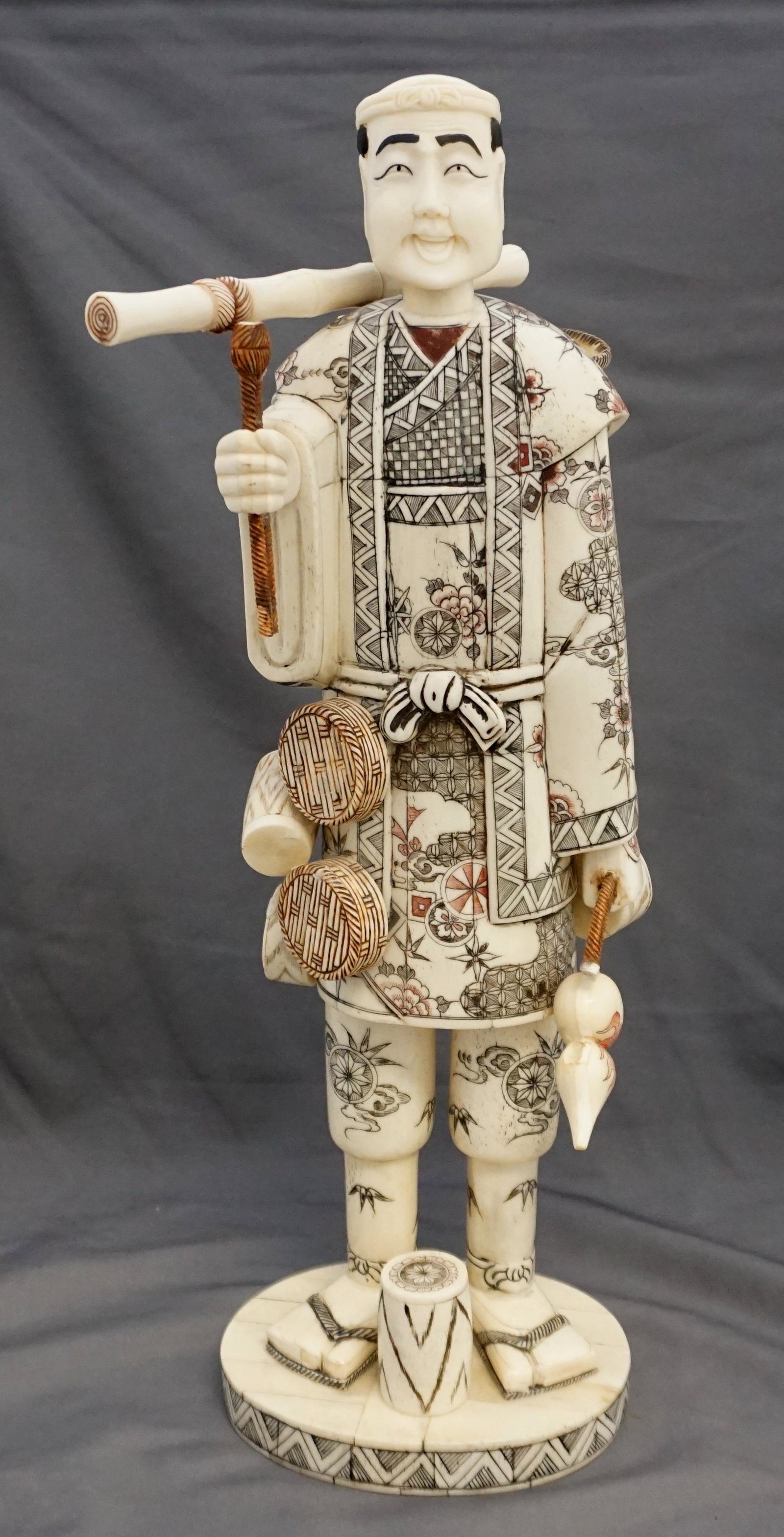 LARGE CHINESE POLYCHROME BONE MAN: Large Vintage Chinese Polychrome Bone Figure, a man with drums. Measures 5 1/2"x6 1/2"x16 1/2". Weight 4 pds 6 oz. NO IN HOUSE SHIPPING. *******Pickup or Shipping on this item offered through, UPS (84