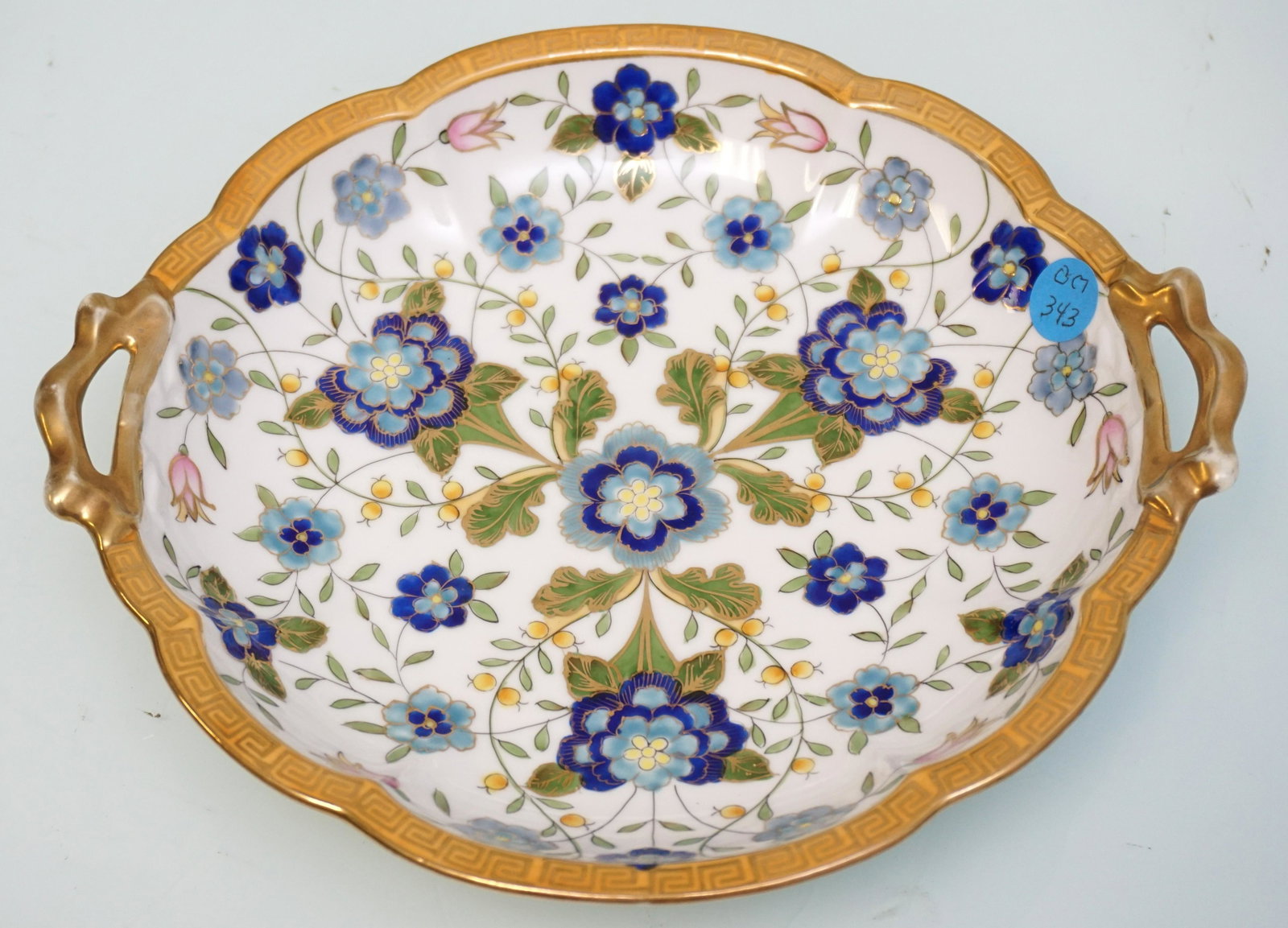 VINTAGE NIPPON HAND PAINTED BLUE PANSY BOWL: Vintage Nippon Hand Painted Blue Pansy Bowl with Handle. Measures 10"x9"x2". Weight 1 pd 2 oz. PROVENANCE: A Private Charleston SC Estate