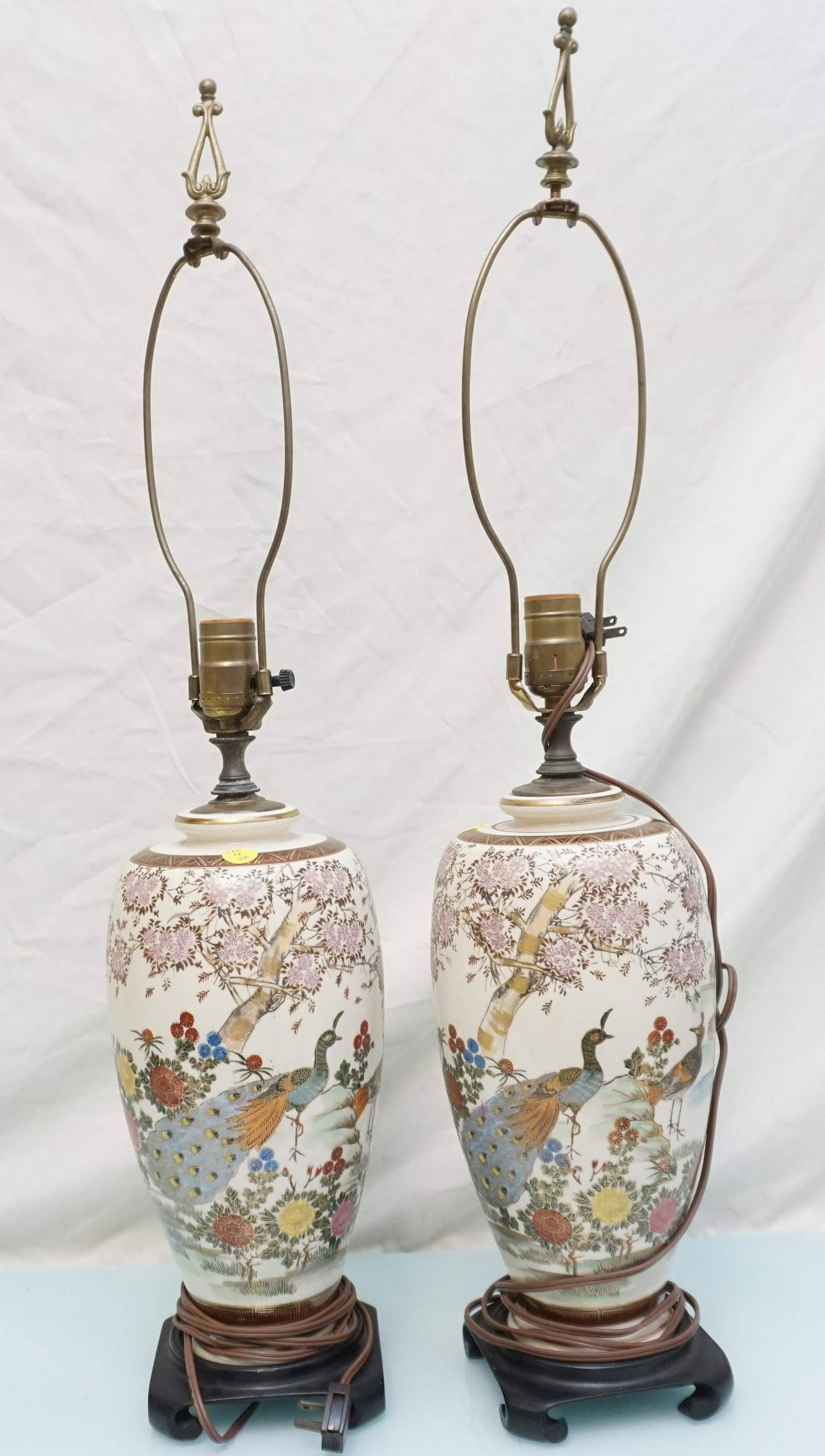 PAIR VINTAGE CHINESE PEACOCK LAMPS: Matched Pair of Vintage Chinese Porcelain Peacock Lampson Wood bases. Each 18 1/2" without harp. Weight 10 pds. PROVENANCE: A Private Charleston SC Estate. NO IN HOUSE SHIPPING. *******Pickup or Shipp