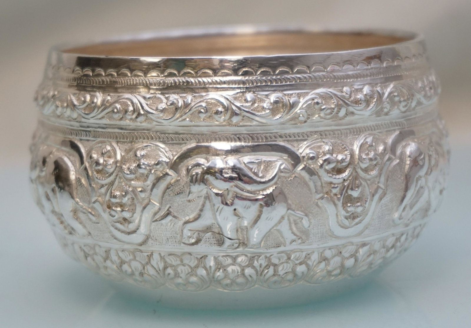 MYANMAR 950 SILVER ELEPHANT BOWL: Vintage Myanmar / Burma Silver Bowl. Ornate Repousse Elephants. Marked Silver 95%. Measures 3.75x2.25. Approximate weight 98 grams. PROVENANCE: A Private Charleston SC Estate