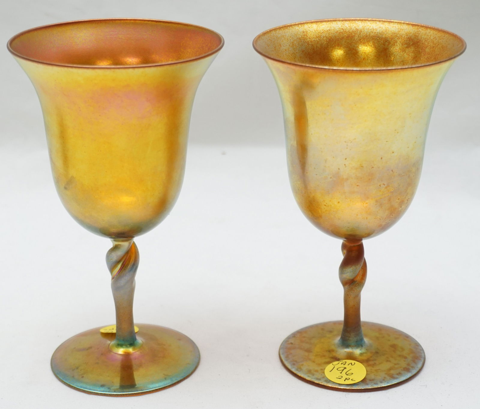 2 STEUBEN GOLD AURENE WINE GLASSES 2361: Two (2) Wine Glasses with Twist Stem Marked Aurene 2361 By Steuben Glass. Each 6". Weight combined 12 oz. PROVENANCE: A Private Charleston SC Estate.