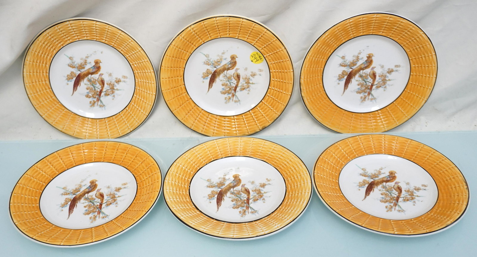 6 ANTIQUE SARREGUEMINES FRENCH FRUIT PLATES: 6 Antique Sarreguemines Pheasant Fruit Plates with basketweave rims. Each 7 1/4". Weight 2 pds 9 oz. PROVENANCE: A Private Charleston SC Estate.