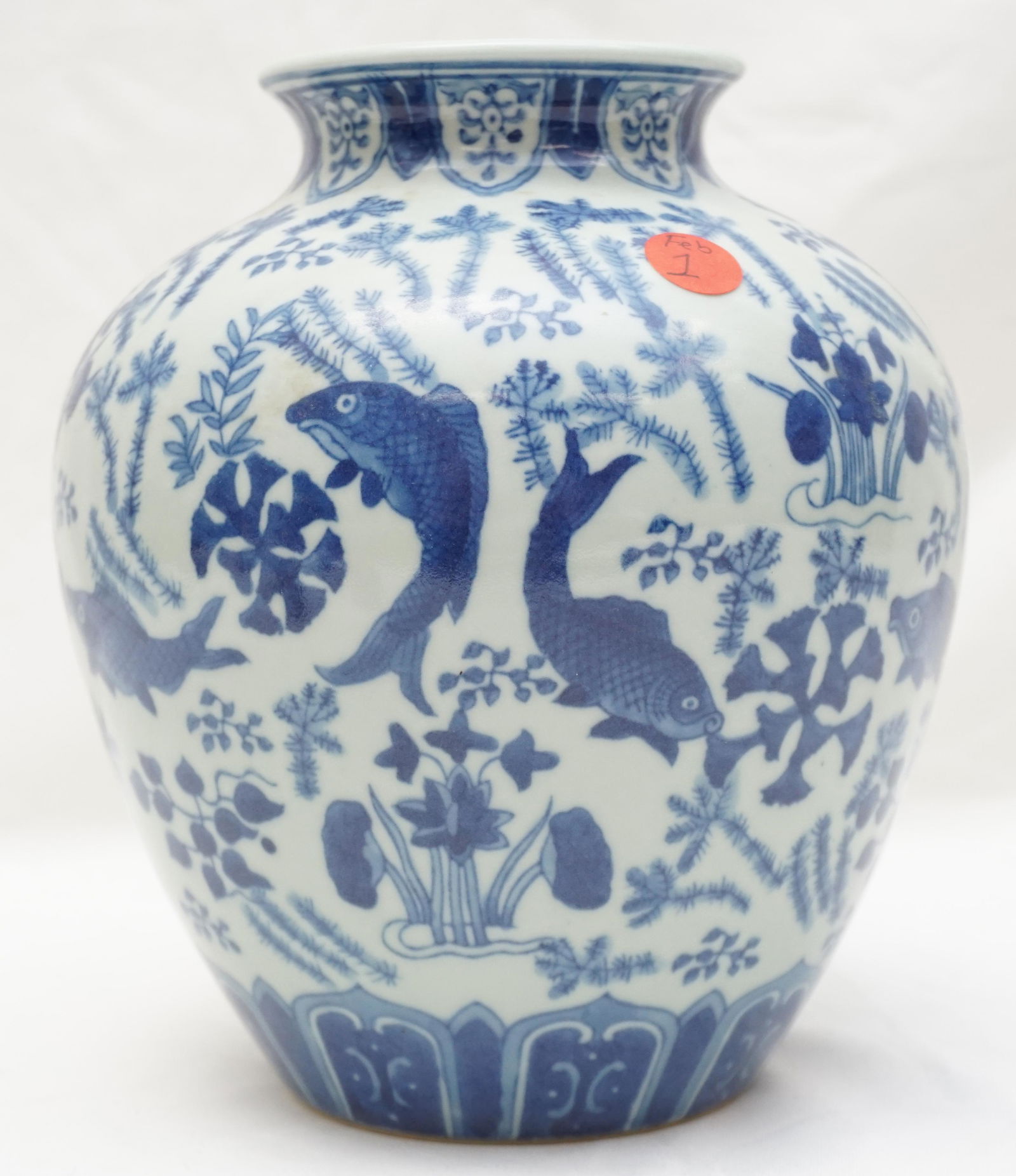 CELADON KOI SEA LIFE VASE: 20th c. Vintage Chinese Celadon Vase with Koi and Sea Life. Mark for Da Qing Qianlong. Late 20th century. Measures 7"x7"x9". Weight 3 pds 10 oz. PROVENANCE: A Charleston, South Carolina Estate