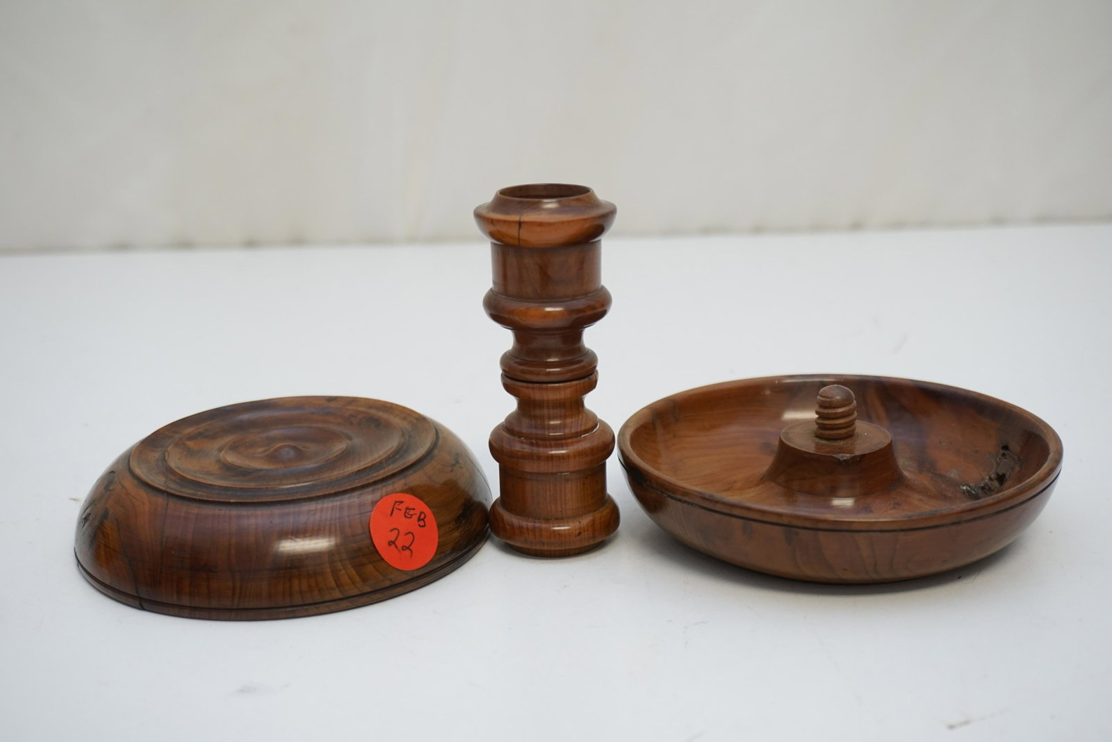 ANTIQUE ENGLISH PAIR TREEN TRAVELING CANDLESTICKS: English 19th c. Pair of candlesticks, turned from fruitwood. Designed to be carried/travelled with, each candlestick unscrews into 2 parts, the sticks are placed into one of the bases, then the 2 base