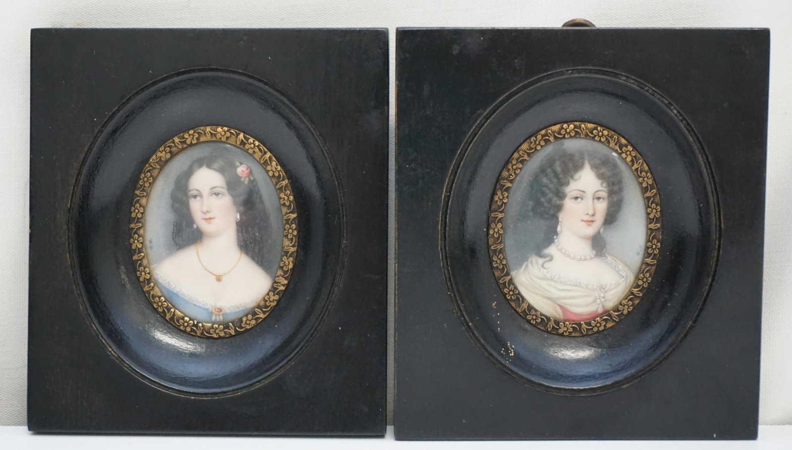 PAIR MINIATURE PORTRAITS YOUNG BEAUTIES: Pair of Antique Finely Painted Miniature Watercolor/Gouache Portraits of Beautiful Young Women in matching frames. Each 3 1/2"x4"x1". Weight 5.5 oz. PROVENANCE: The Audubon Gallery, King Street, Charl