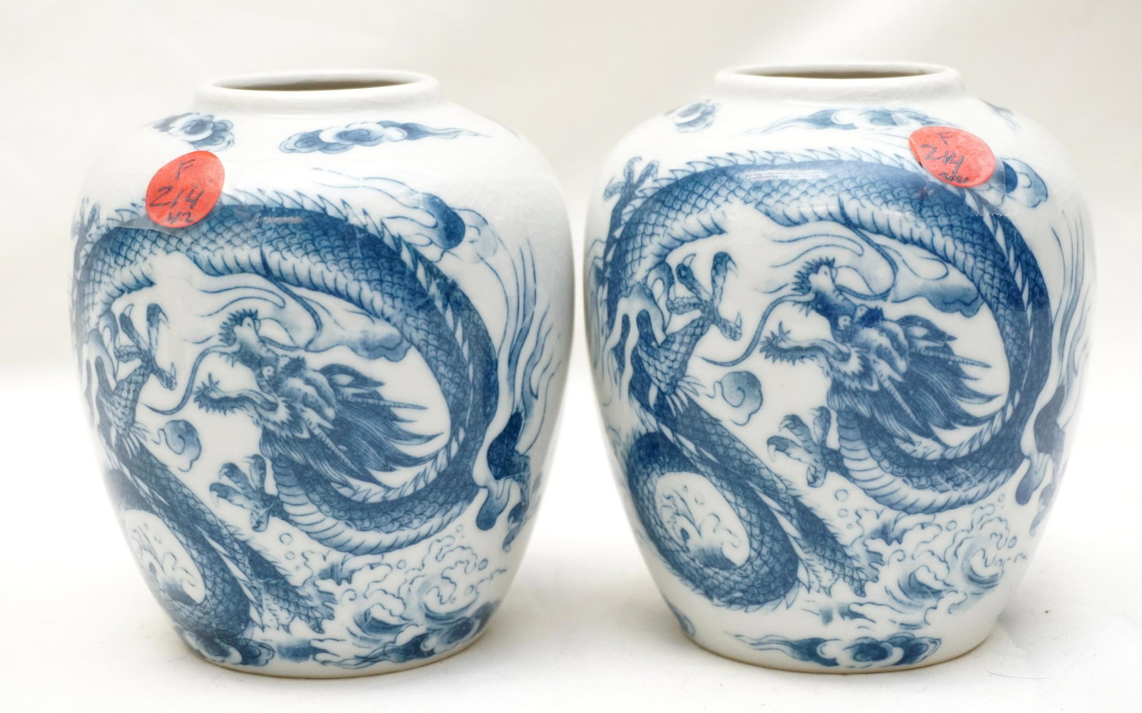 2 ANDREA JAPANESE DRAGON JARS: 2 Vintage Japanese Dragon Jar / Vases Created by Andrea by Sadek . Dragons chasing the elusive flaming pearl of wisdom. They measure approx.5.00" high and weigh a combined 2.5 lbs. Minimum shipping is