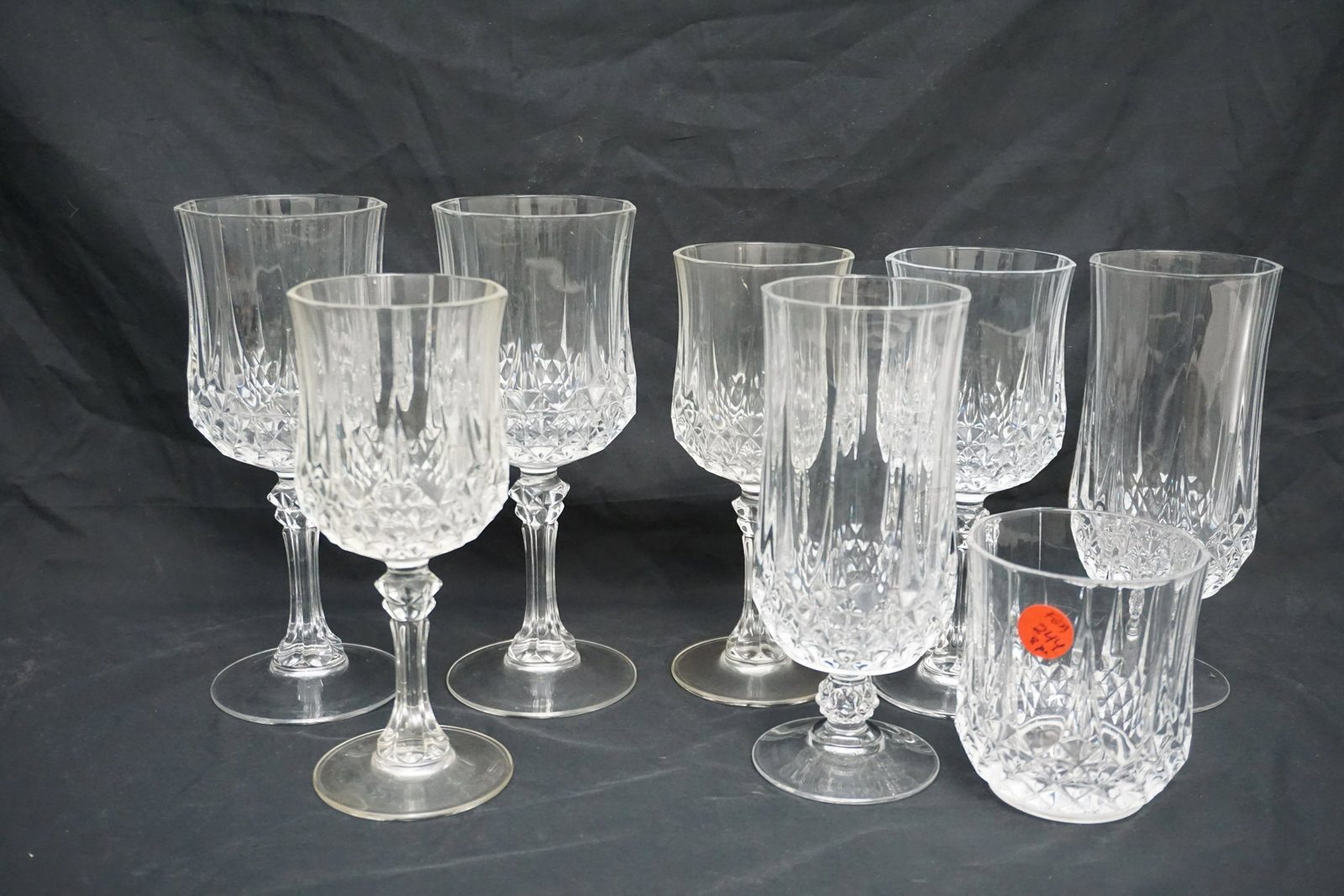 8 PC LONGCHAMP CRISTAL D'ARQUES-DURAND: 8 Pieces of Longchamp Cristal D'Arques. 2 Iced Teas 7". 2 Tall Water Goblets 7 7/8". 3 Wine Glasses 7". 1 Old Fashioned 3 1/2". Weight on all 6 pds. PROVENANCE: A Private Charleston SC Estate