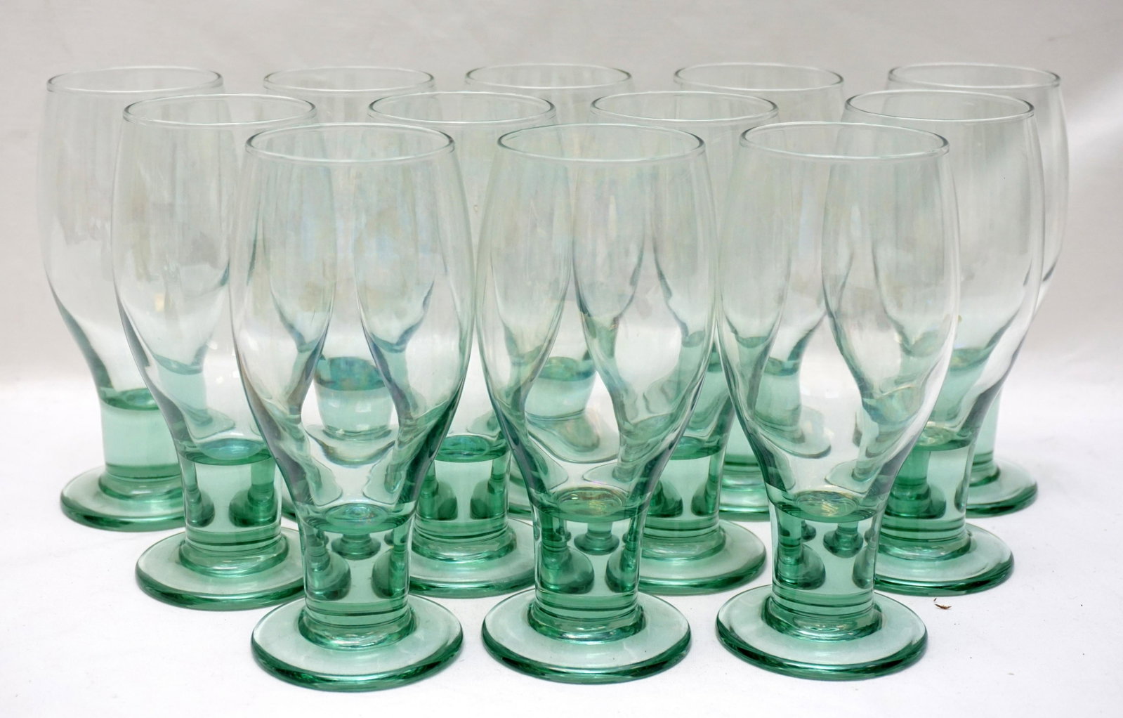 12 VINTAGE LIBBEY SPANISH GREEN GLASSES: 12 Vintage Libbey Glass Spanish Green Water Goblets. Each 6.5",Total weight approx. 8lbs. In house shipping minimum $46.00 + insurance, to east coast. Local pick up is prepacked and $6 prepacking fee.
