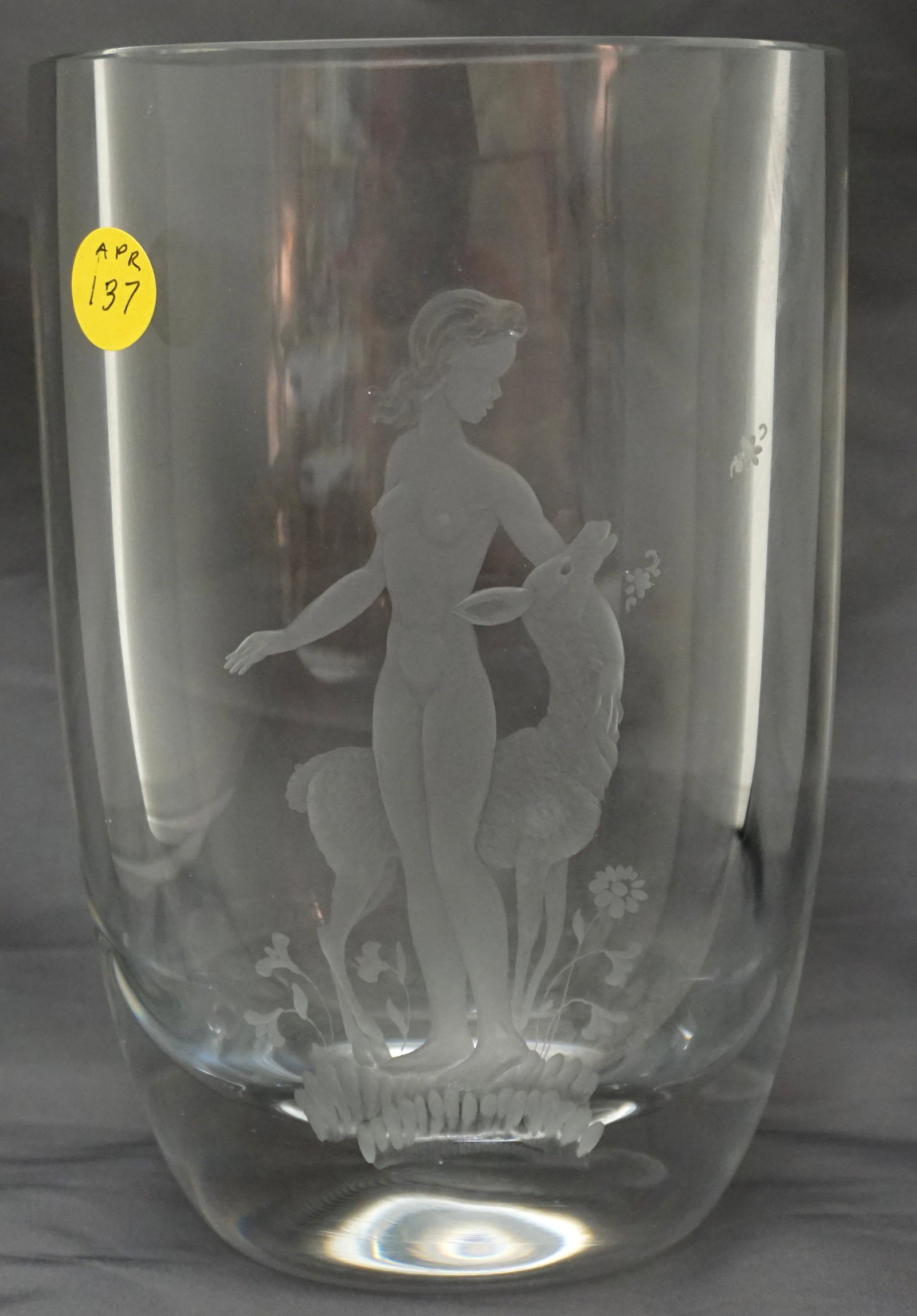ART DECO 1920s LARS KJELLANDER NUDE VASE: Art Deco 1920s Lars Kjellander Swedish Art Glass Engraved Nude with Deer Vase. Signed. Measures 5.5"x4"x8". Weight 6 pds 6 oz. PROVENANCE: A Private Charleston SC Estate.