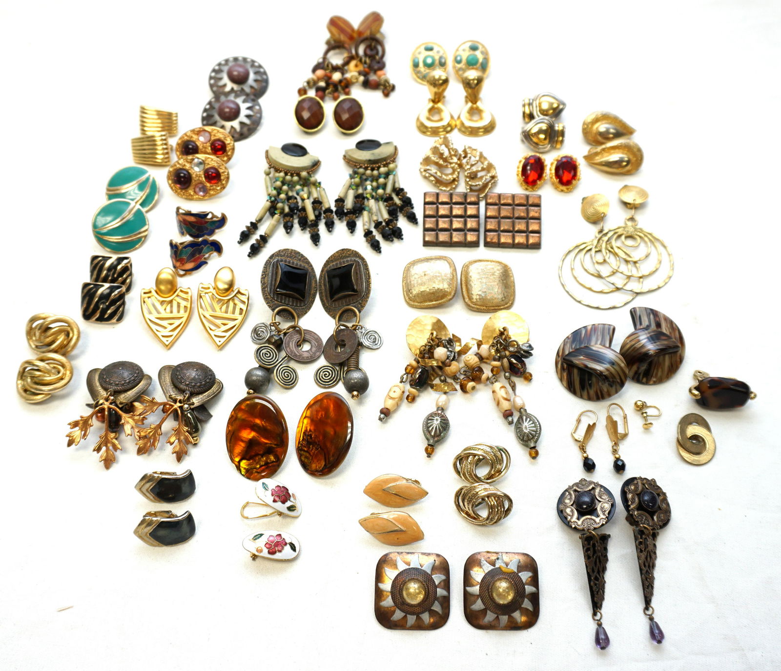 28 PAIR VINTAGE COSTUME CLIP ON EARRINGS +: 28 Pair of Vintage Costume Jewelry Clip On Earrings and 4 Pair of Pierced Earrings Includes Enamel, Lucite, Faux Pearl and more. Weight on all approx 1 pd. 5 oz. PROVENANCE: A Private Charleston SC Es