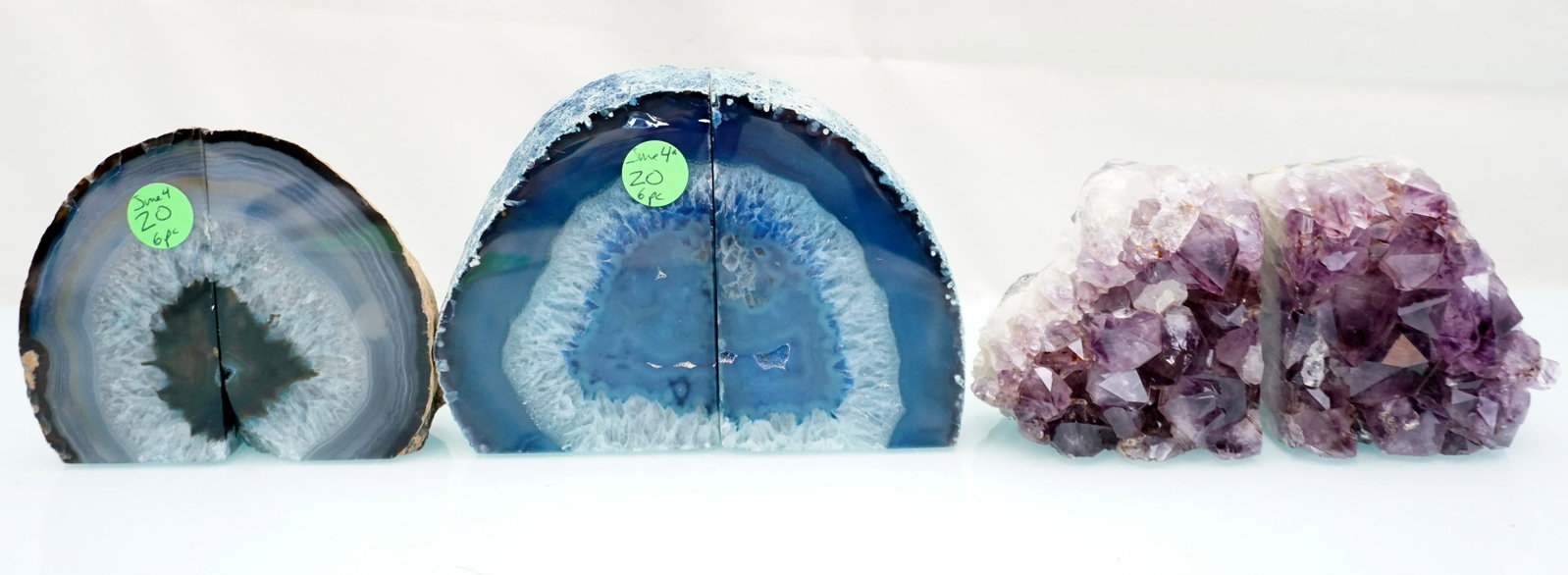 AMETHYST CRYSTAL BOOKENDS: Pair of Purple Amethyst Crystal Bookends. 3"x2.5"x3.25". Weight 3 pds. PROVENANCE: A Charleston SC Private Estate