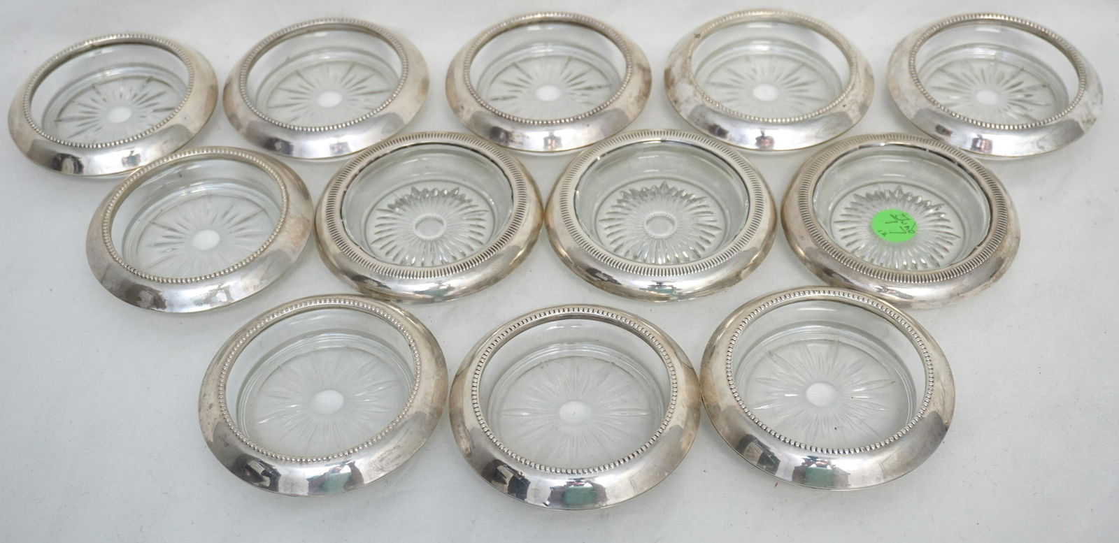 12 VINTAGE STERLING RIMMED COASTERS (1 of 4)