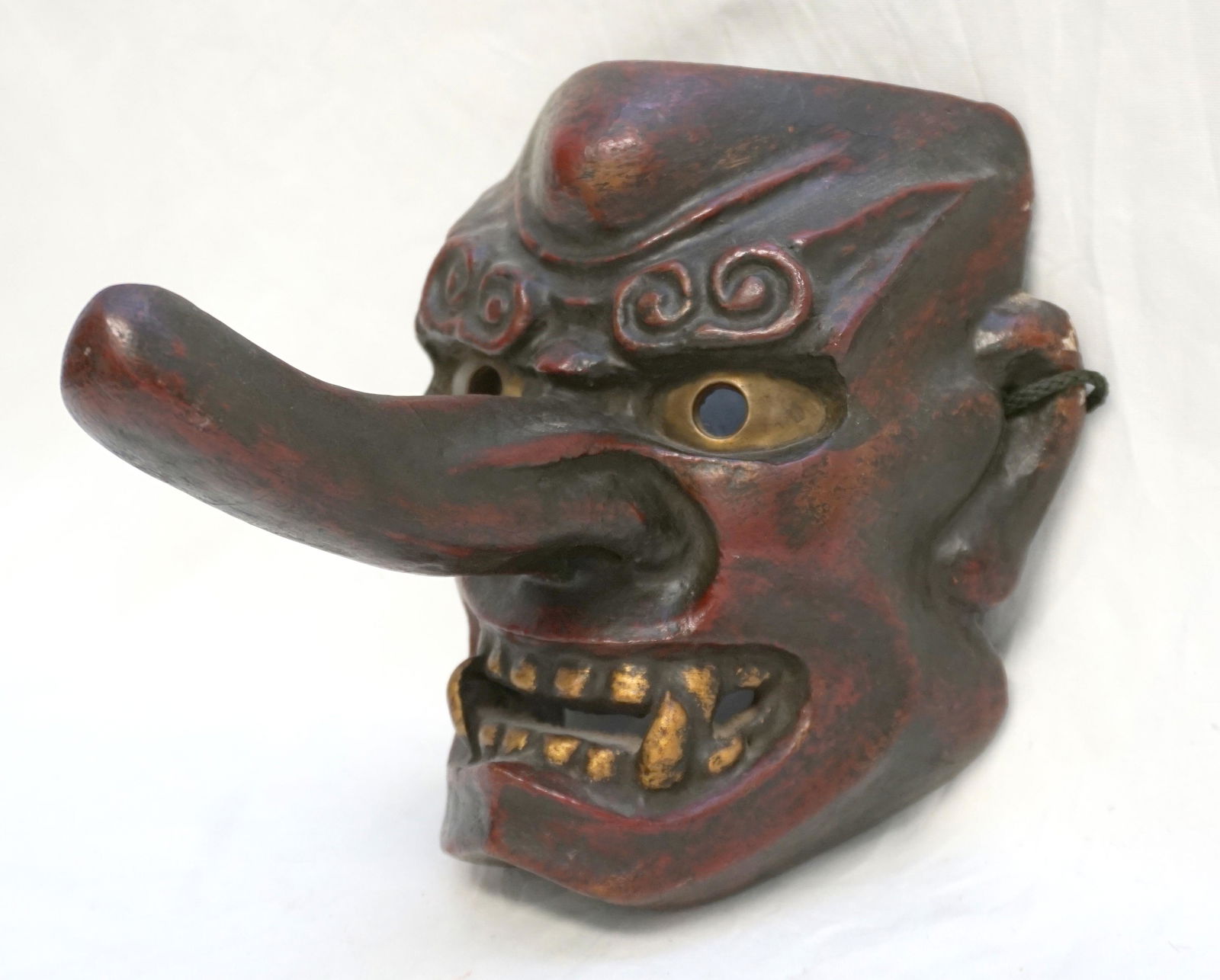 VINTAGE JAPANESE PAPIER MACHE NOH TENGU MASK: Vintage Japanese Papier Mache Tengu Noh Mask with Brass Eyes. 8"x7.75"x9.75". Weight 1 pd 5 oz. PROVENANCE: A Charleston SC Private Estate
