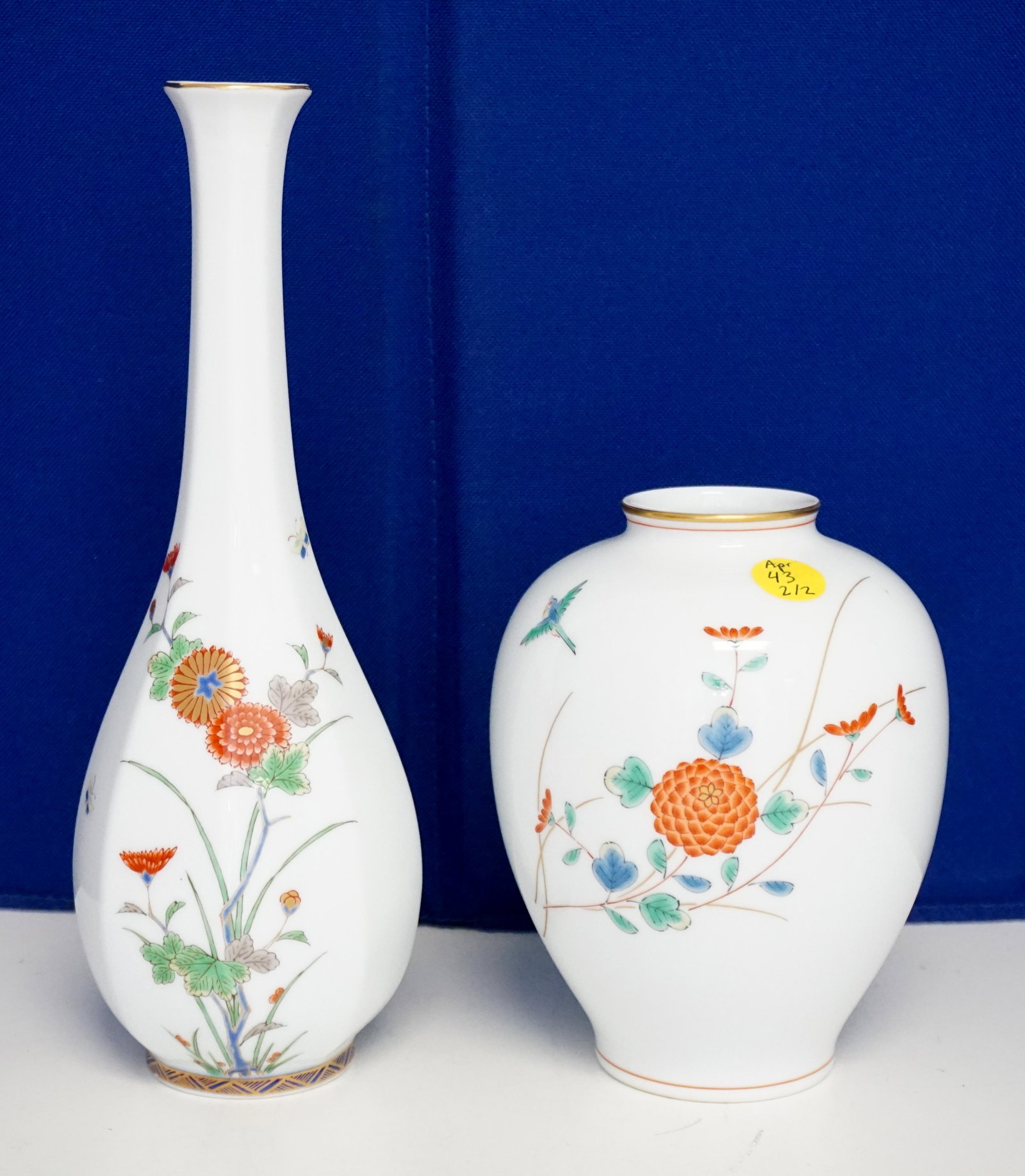 2PC JAPANESE FUKAGAWA SEIJI VASES: 1- Japanese Fukagawa Seiji Hand Painted Porcelain Vase. Measures 3 1/2"x10 1/2". Weight 15 oz. 2- Japanese Fukagawa Seiji Hand Painted Porcelain Vase. Measures 4 1/2"x6 1/4". Weight 15 oz. PROVENANCE: