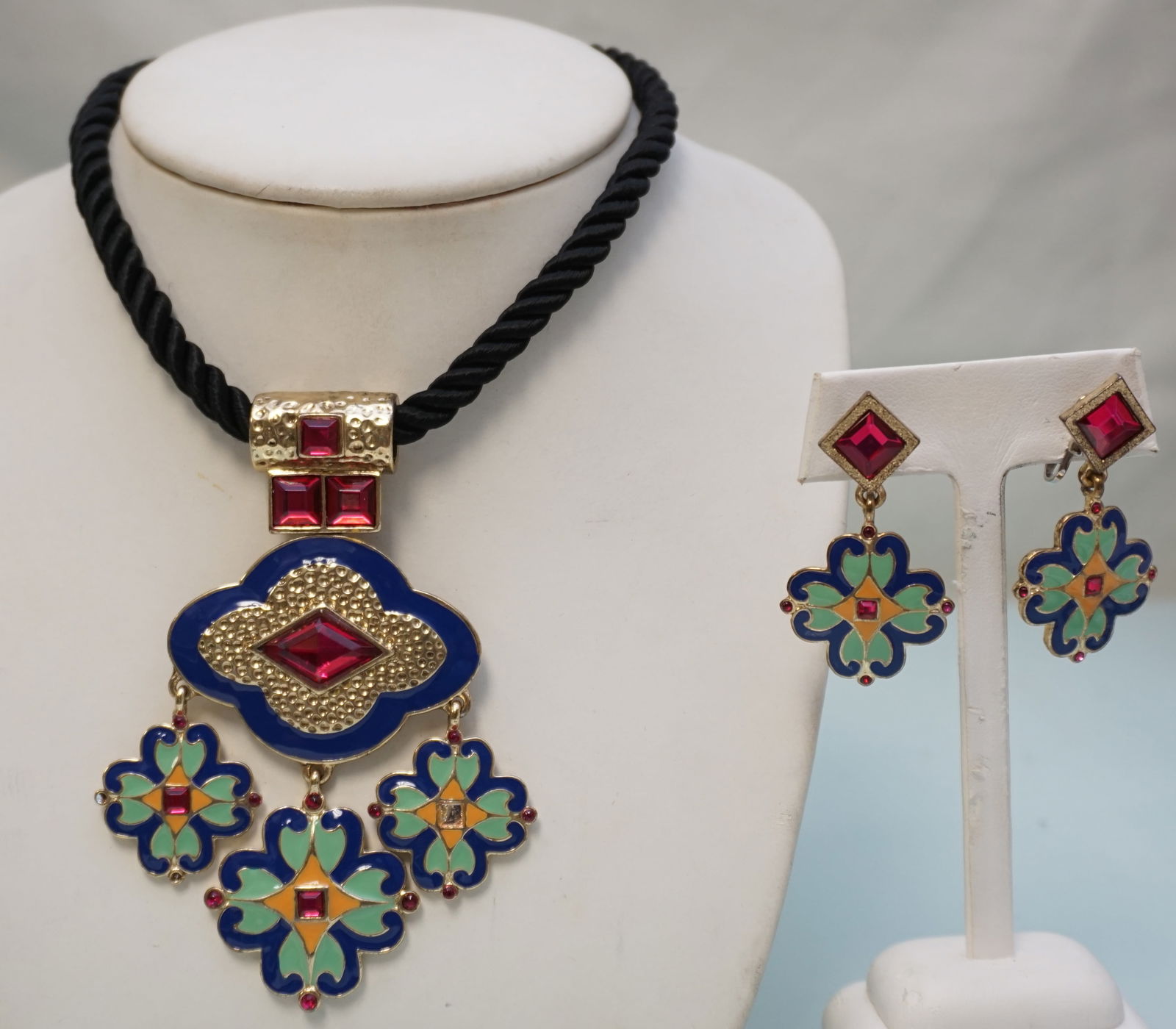 LOULOU DE LA FALAISE DEMI PARURE: Loulou de la Falaise Enameled and Jeweled Demi Parure. Necklace 18" opened and Clip on Earrings 2". Louise Vava Lucia Henriette Le Bailly de La Falaise, known as Loulou de la Falaise, was an English f