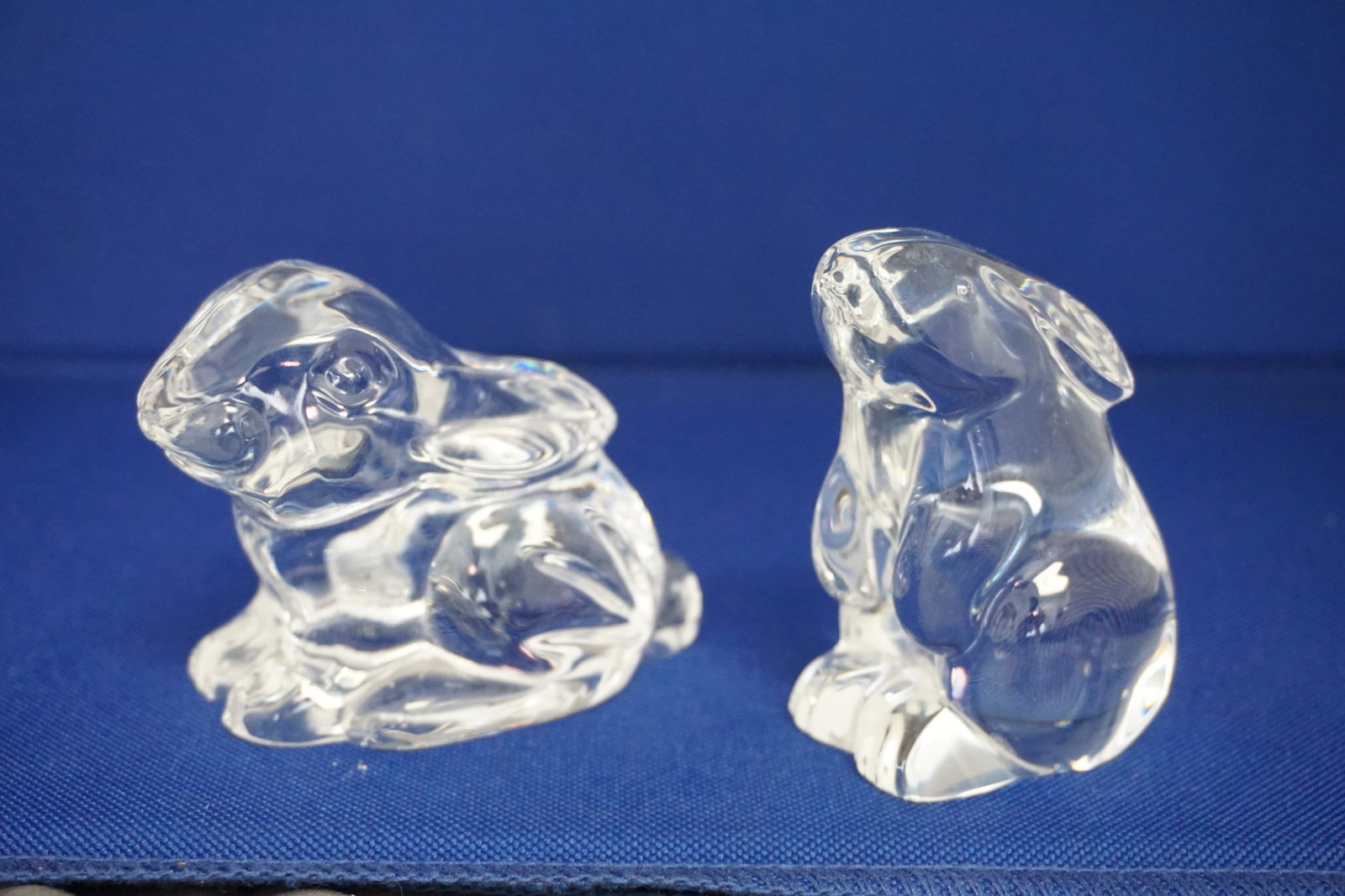2PC BACCARAT & WATERFORD RABBIT FIGURES: Collection of two crystal rabbits. 1- Baccarat measuring approx. 3" H; 2- Waterford measuring approx. 2.5" H. Total weight approx. 2.5lbs