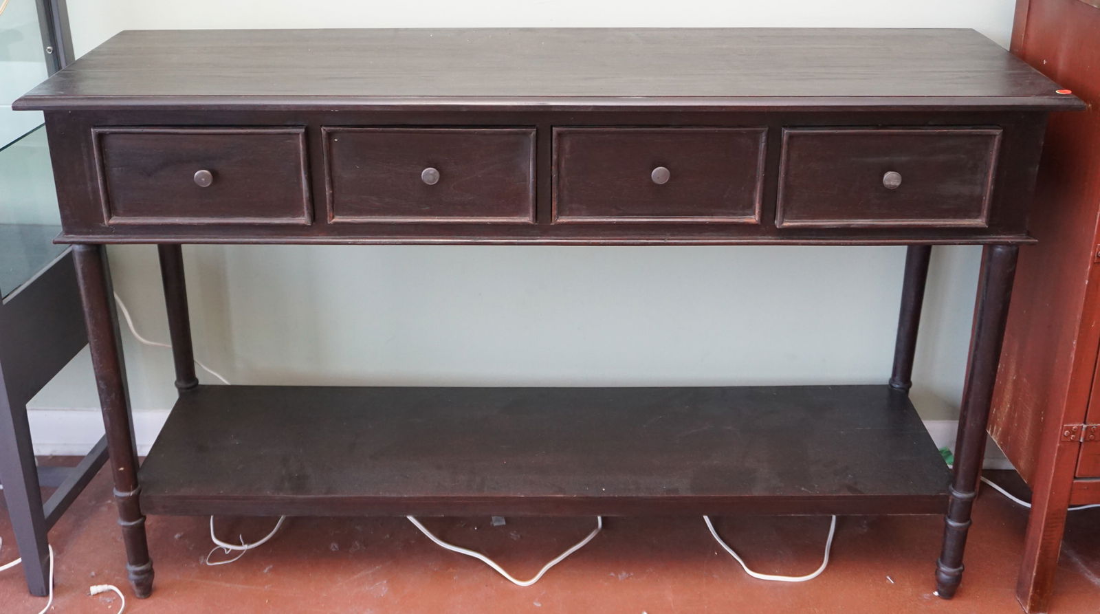 20th c COLONIAL CONSOLE WITH SHELF: 20th c Colonial Style Long Console with Shelf and 4 drawers. 59"x18"x36". PROVENANCE: A Private Charleston SC Estate. NO IN HOUSE SHIPPING. *******Pickup or Shipping on this item offered through, UPS