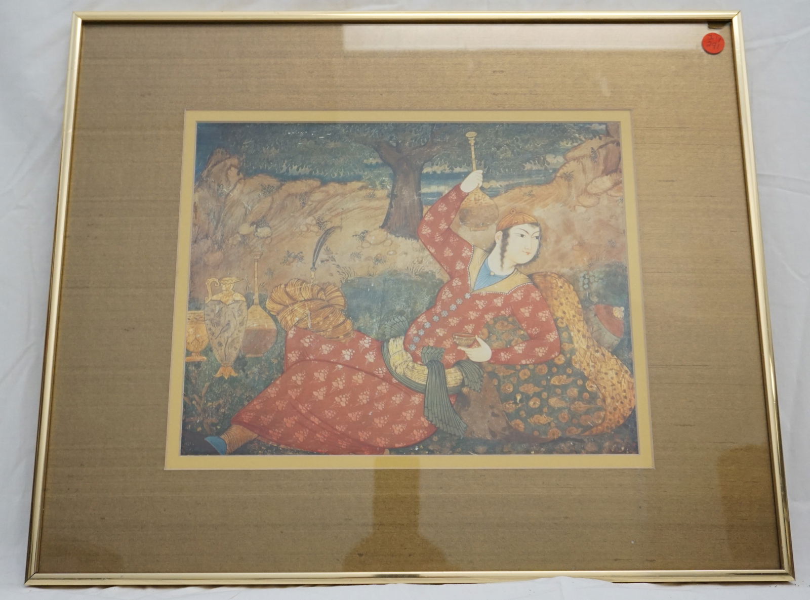 VINTAGE INDO PERSIAN FRAMED PRINT: Vintage Indo Persian Reclining Man with Wine. Professionally frame with Silk Mat. In frame measures 22 1/4"x18 1/2"x1". Weight 6 pds. . PROVENANCE: A Private Charleston SC Estate.