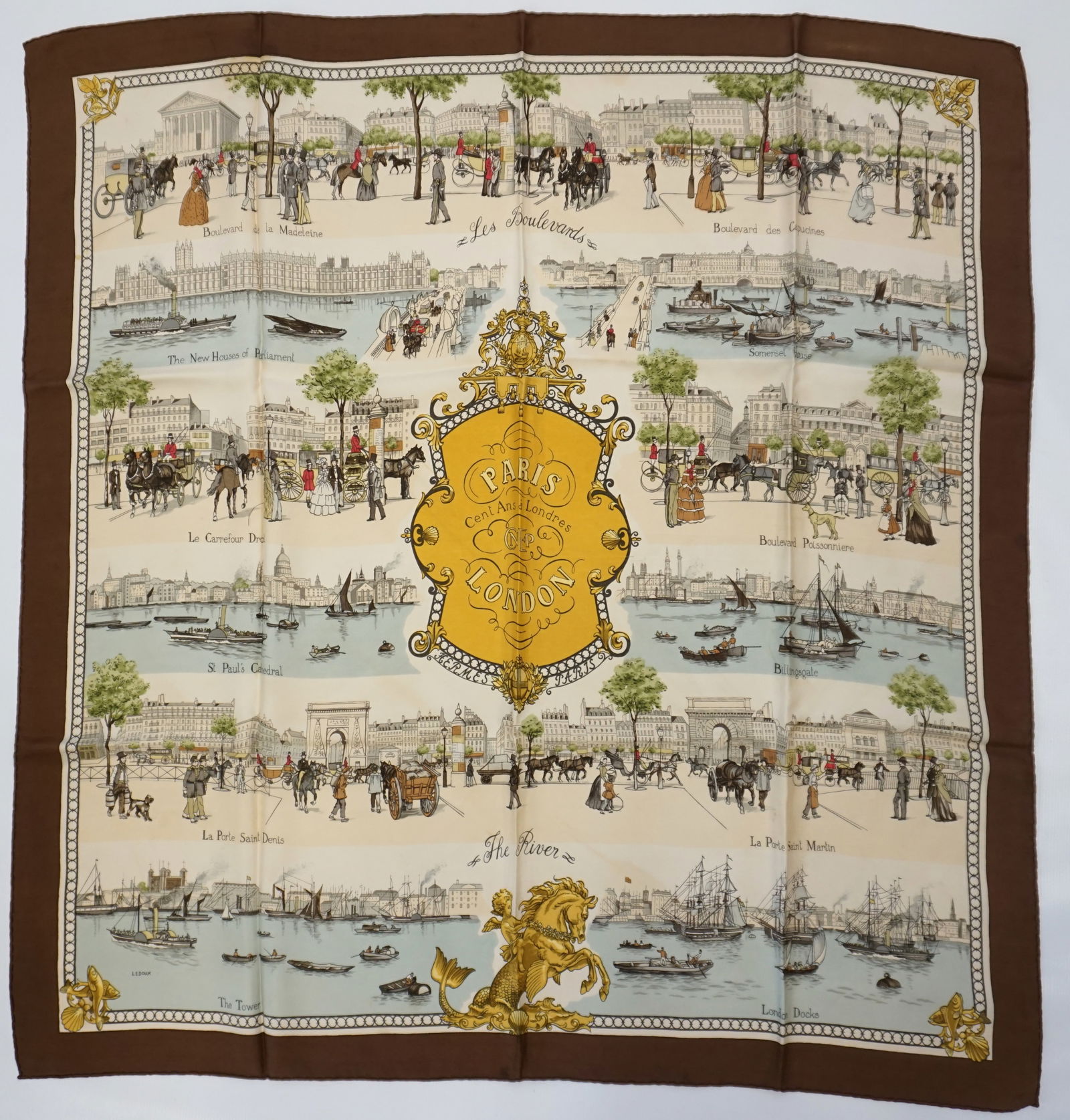 HERMES PARIS "PARIS LONDON" SILK SCARF: HERMES PARIS silk "Paris London" scarf. The scarf celebrates the centennial of CNEP's branch in London, a major french bank at the time of the scarves drawing. The scarf features multiple scenes of da