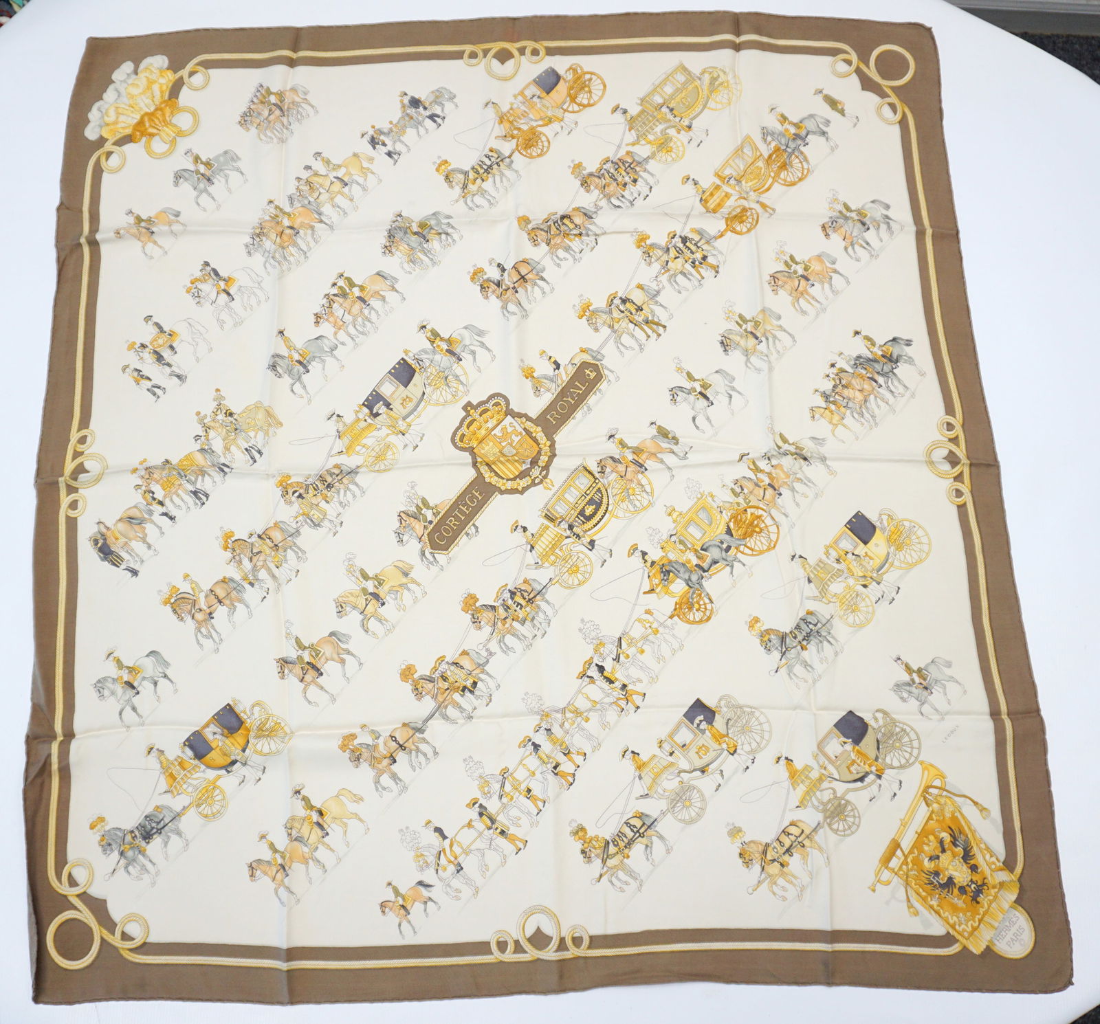 HERMES PARIS "CORTEGE ROYAL" SILK SCARF: HERMES PARIS silk "Cortege royal" scarf. The scarf captures the grandeur and elegance of various royal cortèges from different historical French periods and various occasions. It's a tribute to t