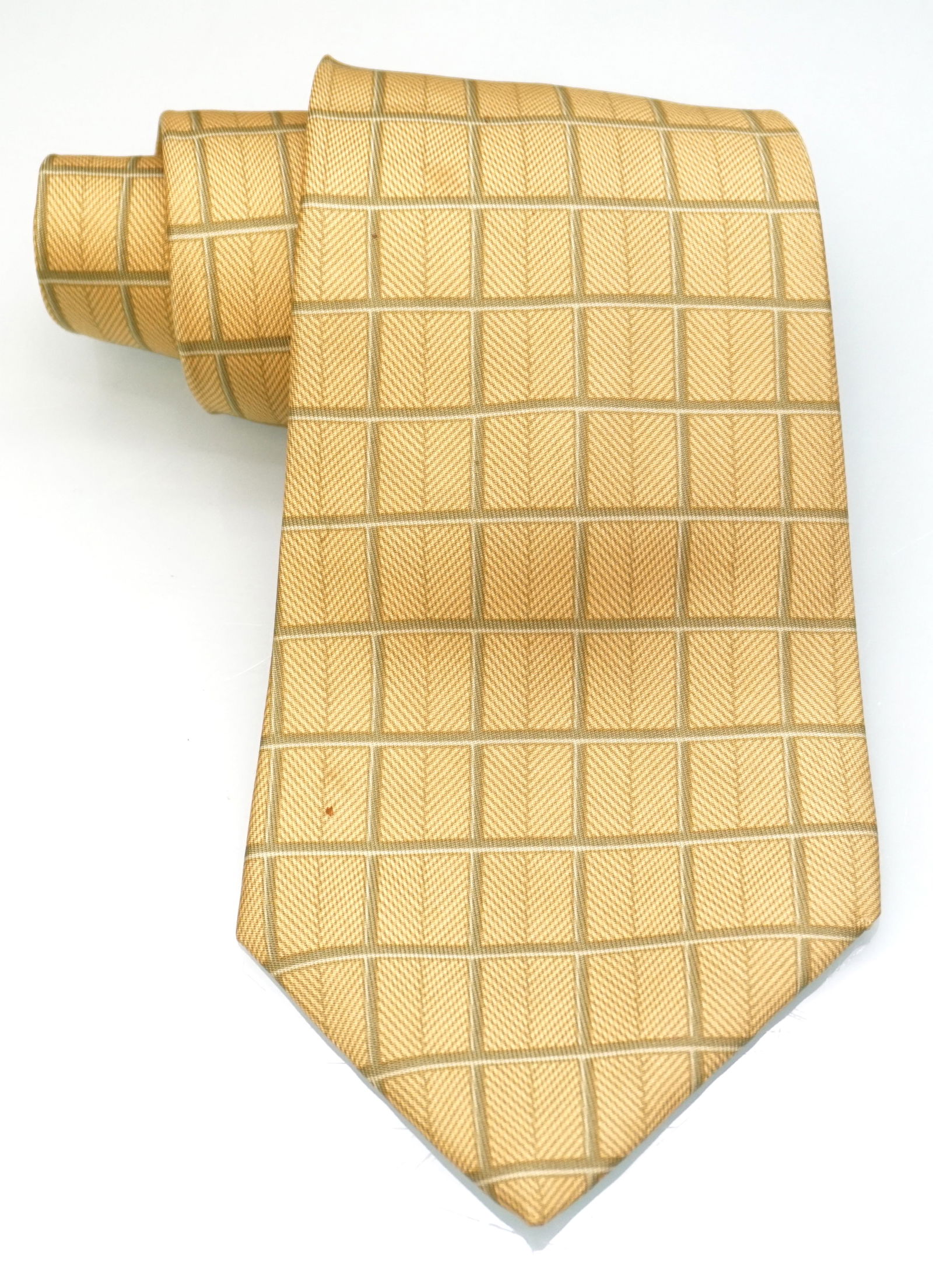 HERMES PARIS SILK WHEAT TIE : HERMES PARIS silk tie. Wheat silk tie with checkered olive pattern over golden wheat details. Sewn in tag present. Length : Width :
