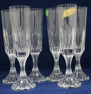 6 BACCARAT CRYSTAL D'ASSAS CHAMPAGNE FLUTES: Six (6) Baccarat Crystal D'Assas Fluted Champagnes. Each 8 1/2". Purchased in 1979 at Baccarat in Paris. Shipped by Baccarat, the glasses remained in the Original Shipping Box until this auction. Exce