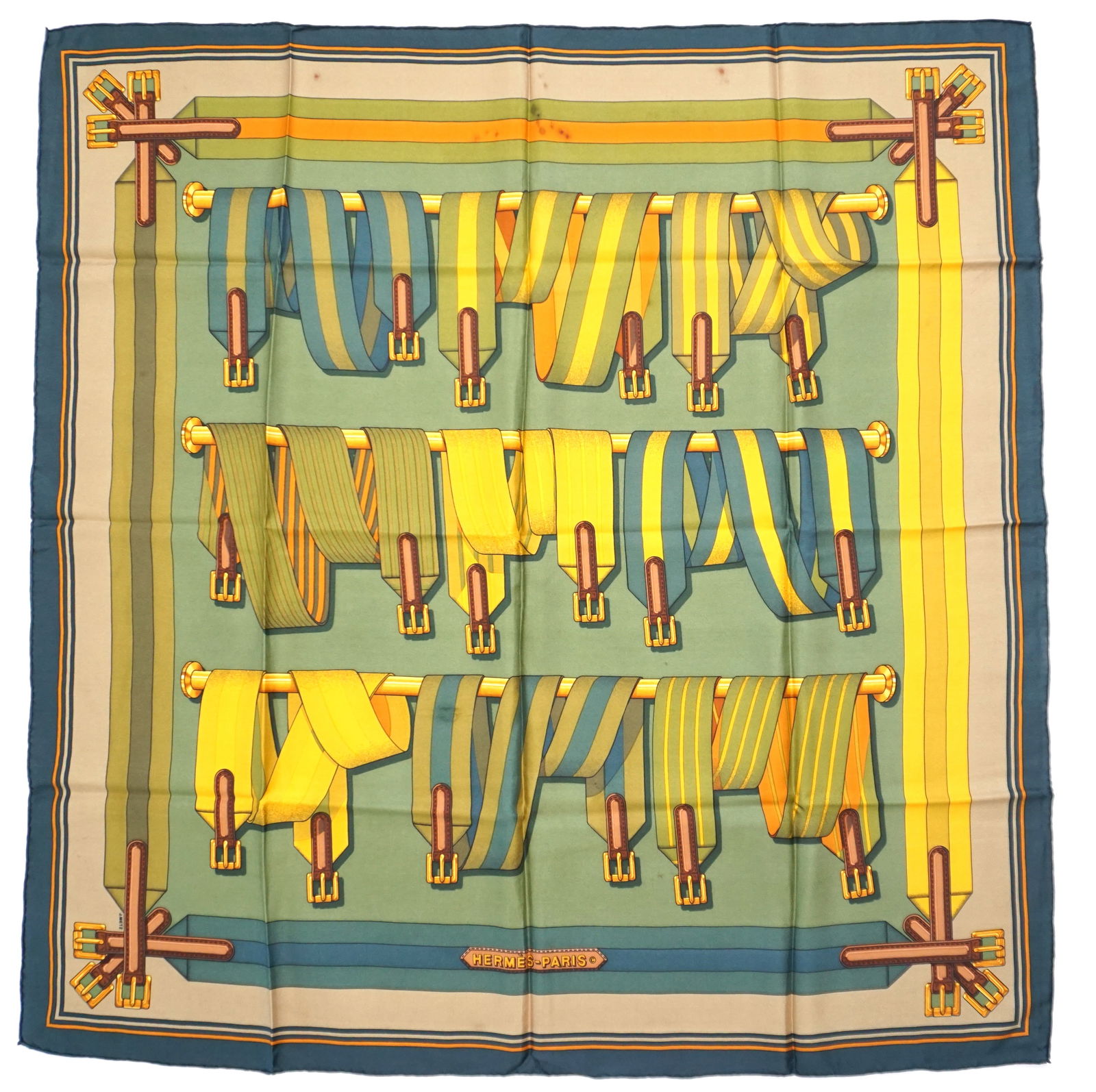 HERMES PARIS "SANGLES" SILK SCARF: HERMES PARIS silk “Sangles” scarf. The scarf features a series of intricate and artistic illustrations of "sangles," which are French for straps or belts, in various shades of vivid and muted