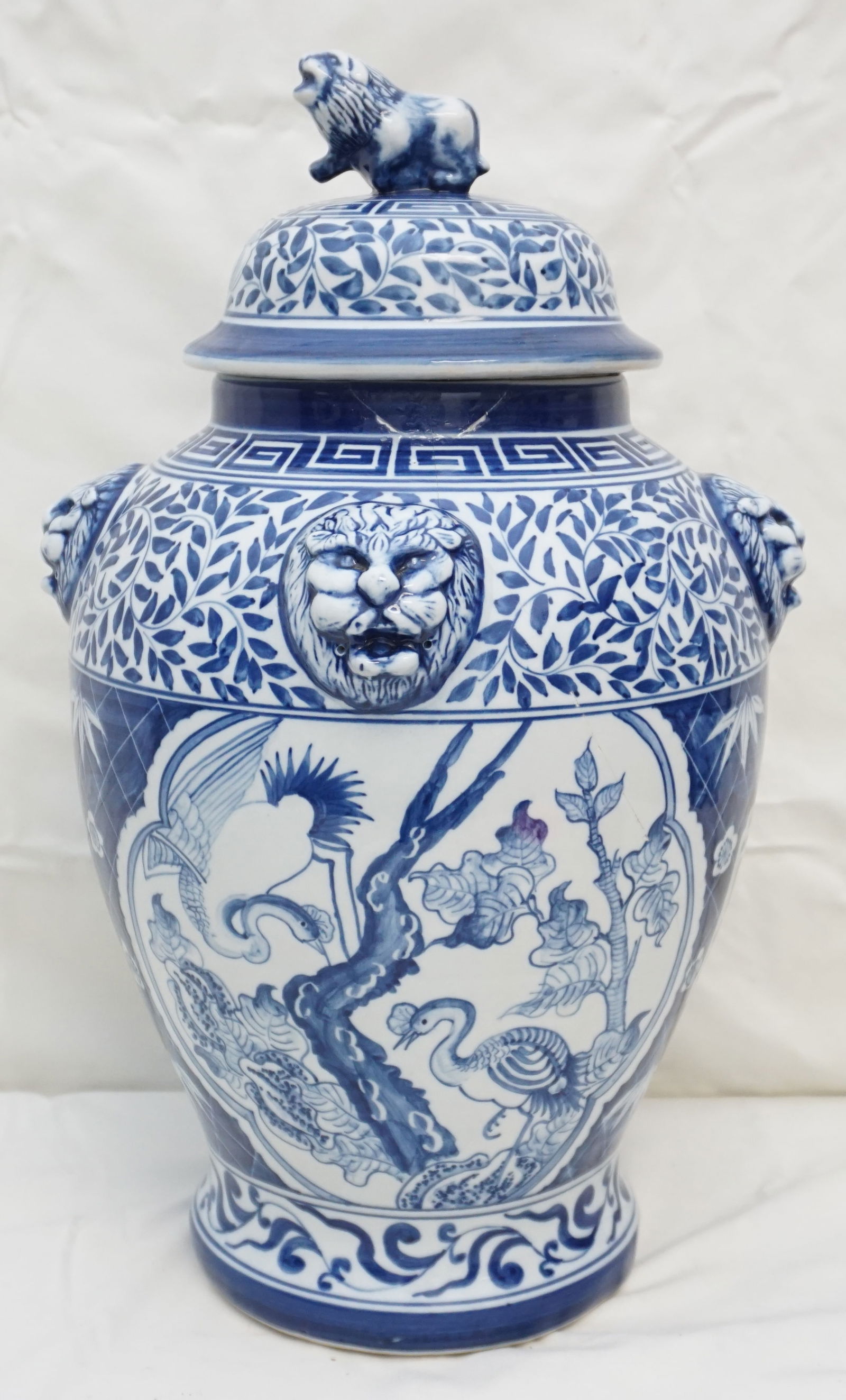 LARGE BLUE AND WHITE LIDDED JAR WITH LION ACCENTS (1 of 11)
