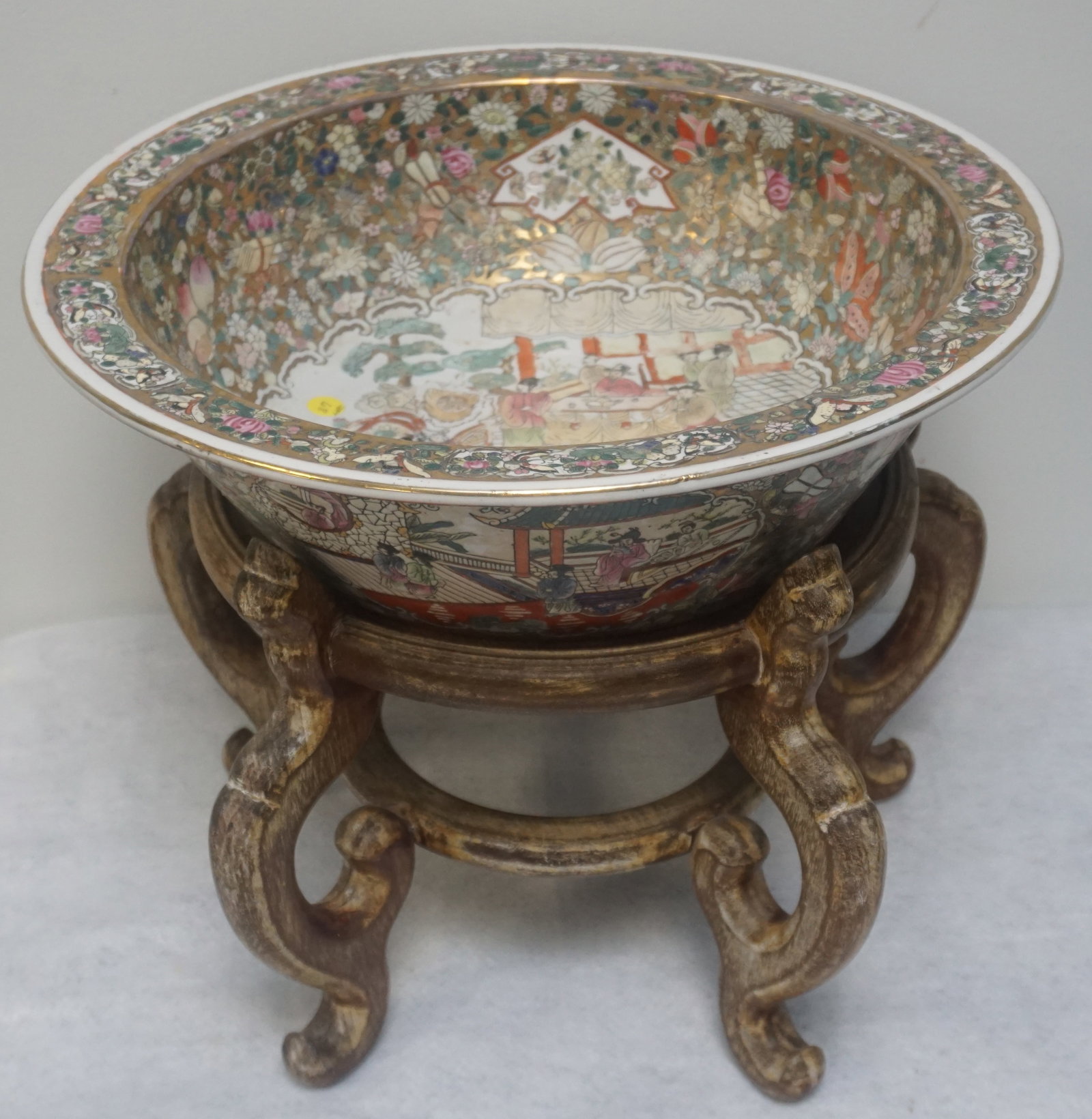 LARGE FAMILLE ROSE BOWL WITH STAND: Large Vintage 20th c. Famille Rose Bowl with wood stand. Bowl 19"x19"x5". Stand 16"x16"x11". NO IN HOUSE SHIPPING. Pickup only or Shipping on this item offered through, UPS (843) 203-3466 store7194@th