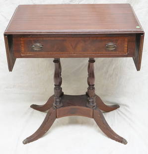 ANTIQUE LANDSTROM FURNITURE MAHOGANY DROP LEAF OCCASIONAL TABLE: Antique mahogany Landström furniture, one drawer tilt top occasional table. The piece has four fluted mahogany columns with inlay curled base and curved brass legs with brass claw feet. The piece mea