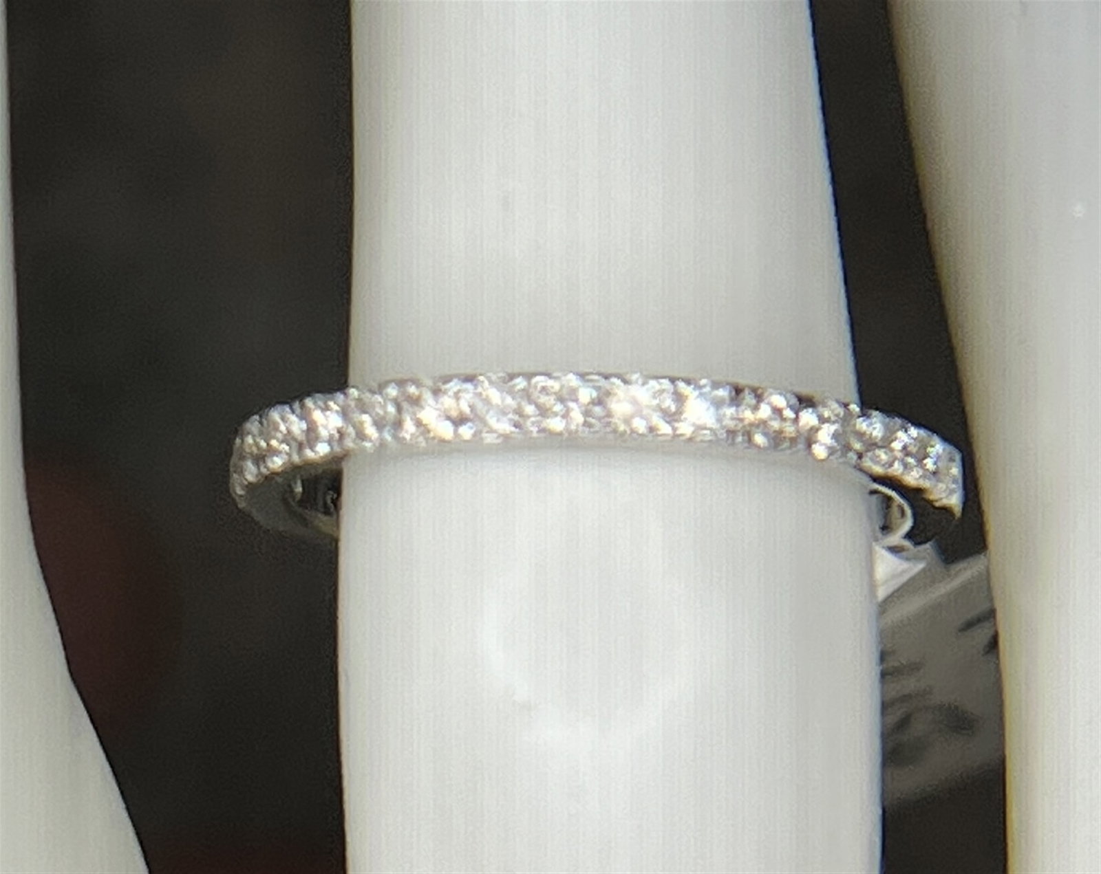 14KT WHITE GOLD DIAMOND BAND (SZ 5.75): 14kt White Gold Diamond Band features 0.30cts of "G-H" color, SI1-SI2 clarity diamonds in a size 5.75. Crafted in white gold for durability and shine, it's ideal for daily wear or stacking with other 