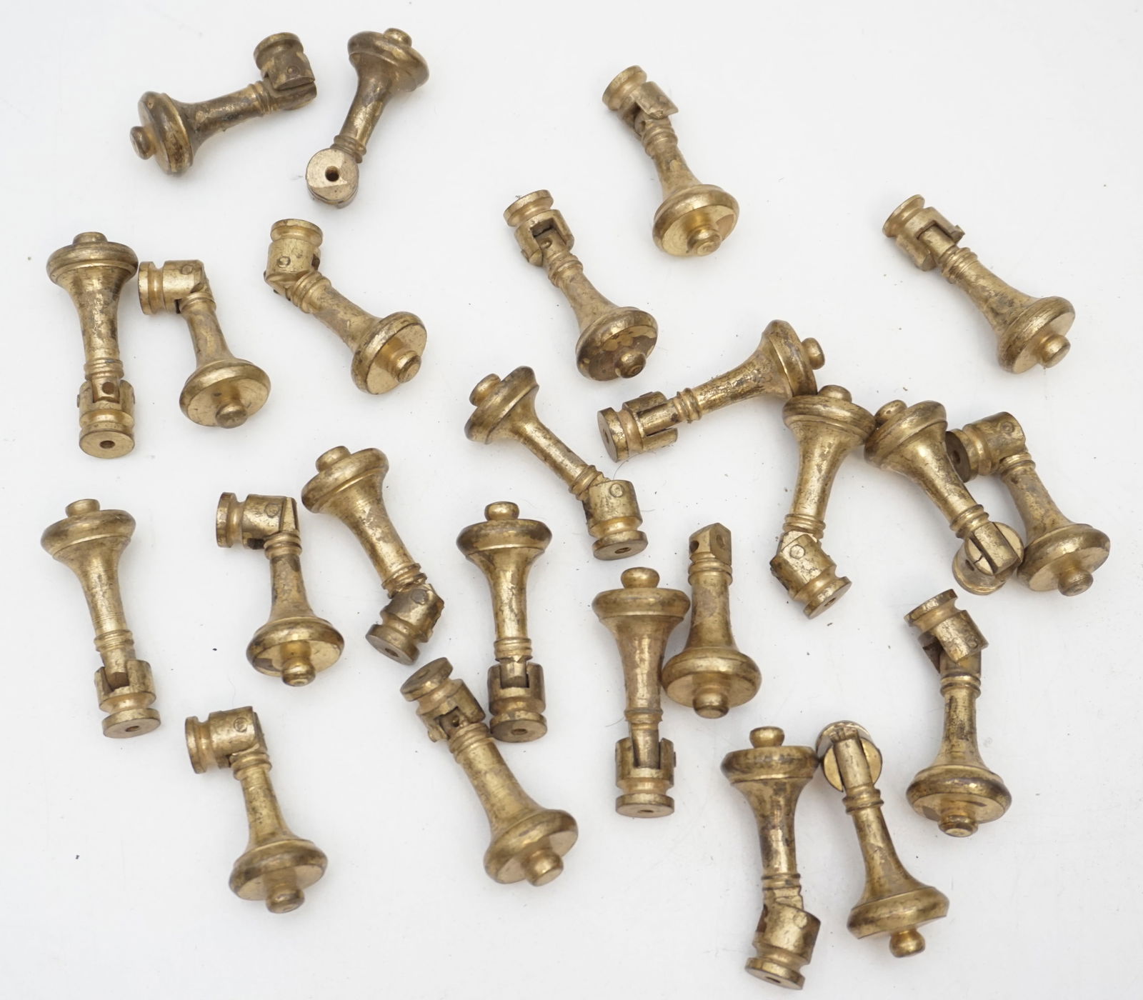 COLLECTION 25 HINGED BRASS DRAWER PULLS (1 of 4)