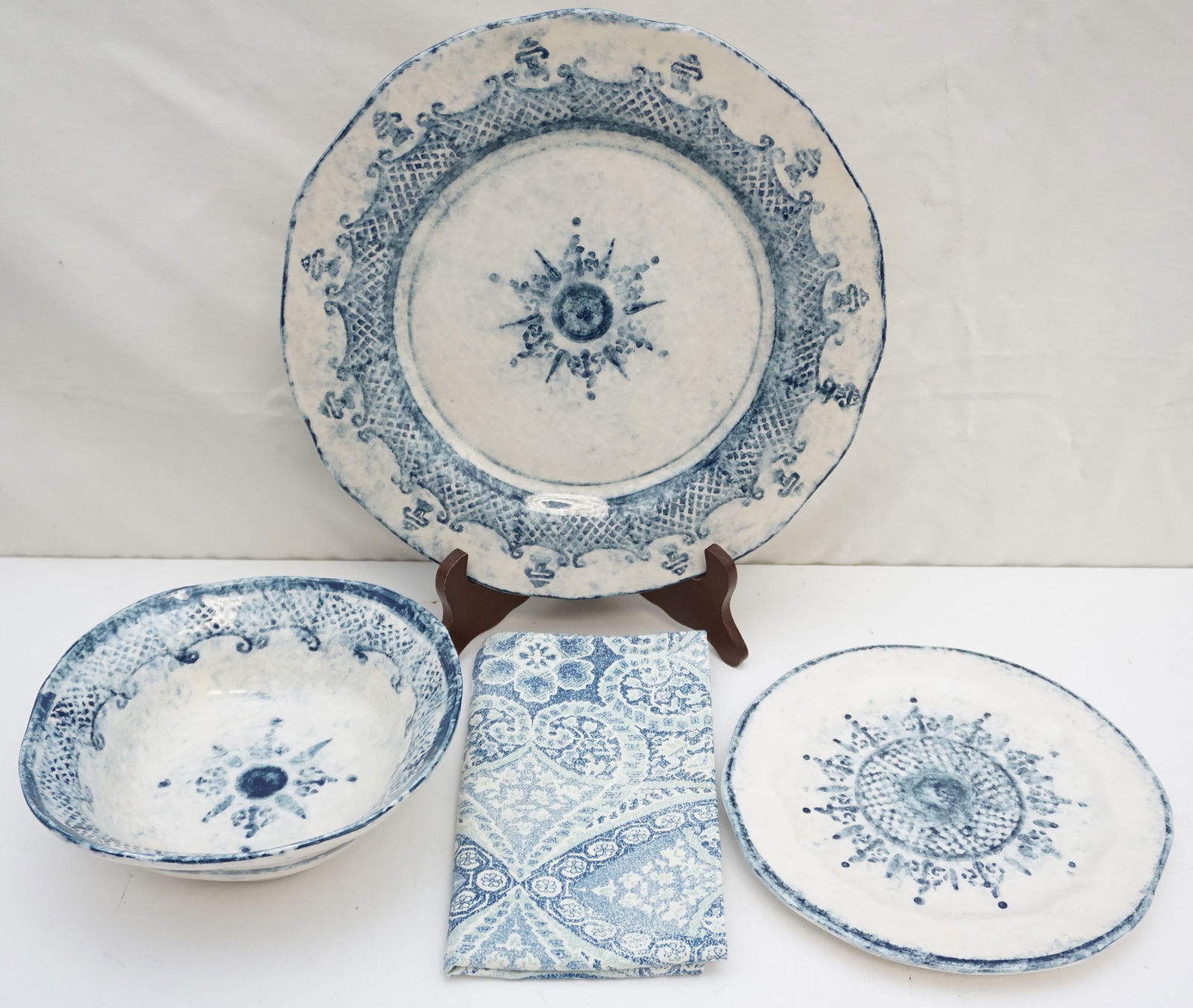 "BURANO" BY ARTE ITALICA SERVICE FOR 6 (18PC): "Burano" by Arte Italica, an 18-piece service for 6 featuring six Vietri placemats, dinner plates (12" diameter), salad plates (8.50" diameter), and cereal bowls (7.75" diameter). This collection weig