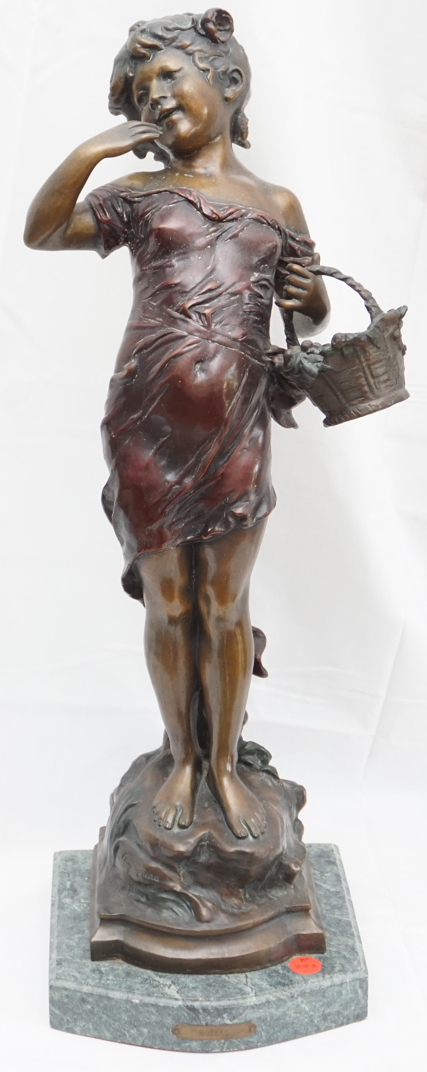 BRONZE STATUE OF GIRL LAUGHING WITH BASKET (1 of 6)