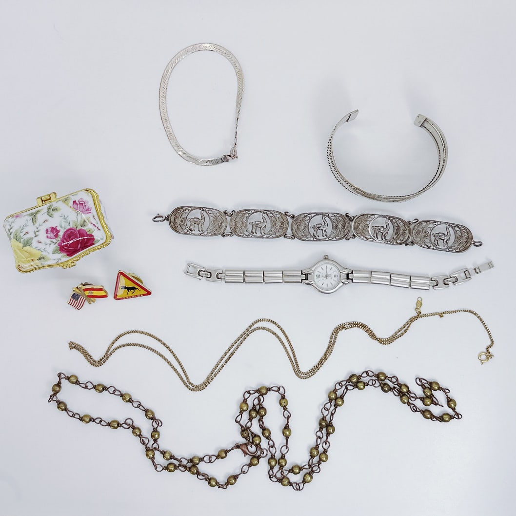 SILVER BRACELET COLLECTION: Discover the allure of elegance with this collection of various silver bracelets, each exuding its own unique charm. Adorn your wrist with a bangle bracelet, showcasing timeless sophistication, or opt