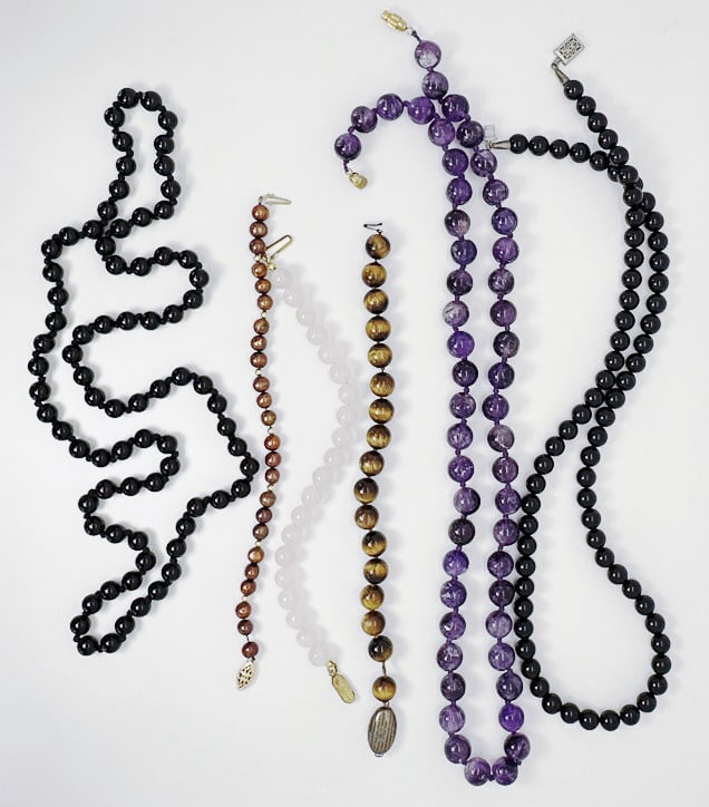 GEMSTONE BEAD NECKLACES: Indulge in the enchanting beauty of this 6-piece collection of various bead necklaces and bracelets, each piece a testament to exquisite craftsmanship and artistry. Adorn your neckline with the timele