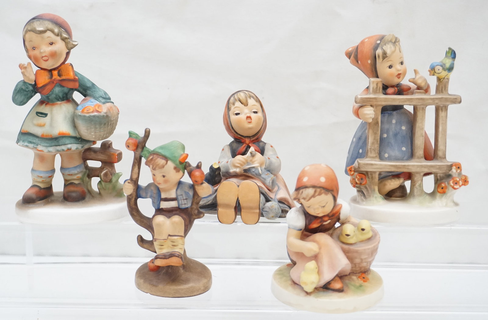 COLLECTION 5 HUMMELS: Box of Hummels. Set of five. General size, height 6 inches and under. Weight of box 2 pounds.