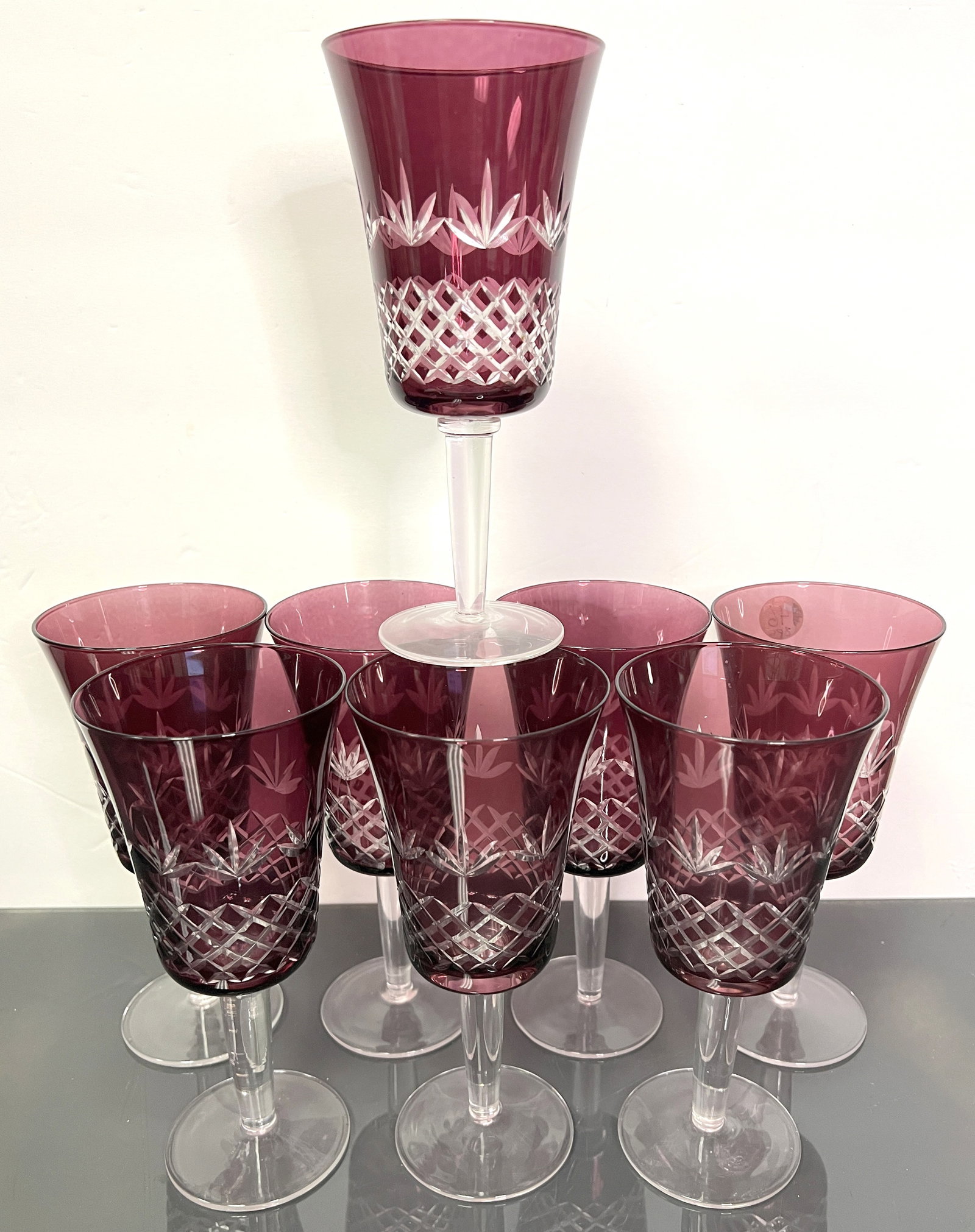 8PC AMETHYST CUT TO CLEAR CRYSTAL WINES: 8PC Amethyst Cut-to-Clear Crystal Wine Glasses showcasing stunning amethyst hues with intricate lattice cuts. Each measures 7.50" tall, adding a touch of luxury to any table setting.