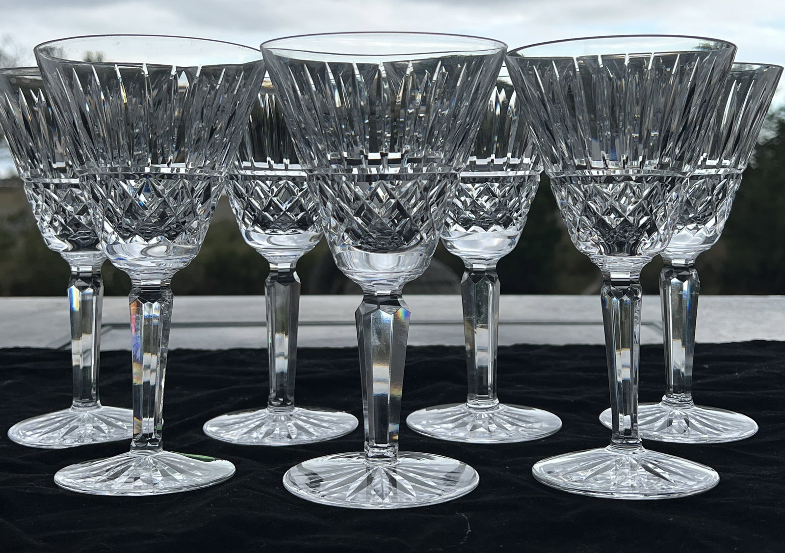 8PC Waterford Crystal Maeve Claret Wine Glasses: 8PC Waterford Crystal Maeve Claret Wine Glasses, each boasting refined, elongated cuts for a sophisticated design. Each glass measures 6.80" tall; shipping weight 10lbs. Beautiful for collectors or fo
