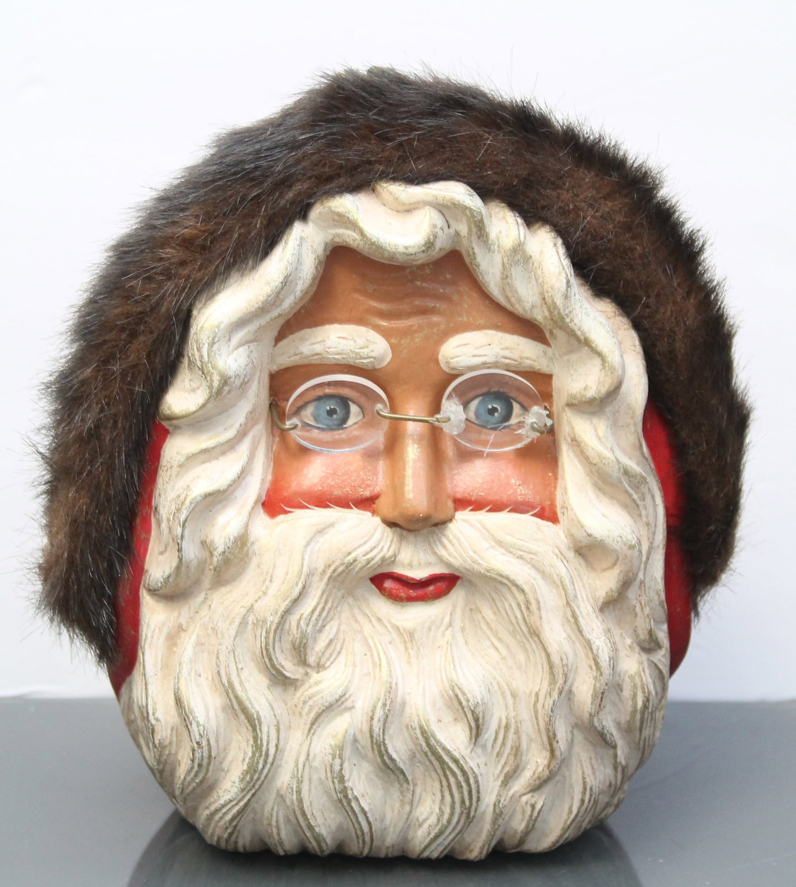 TIMMY WOODS BEVERLY HILLS SANTA HANDBAG: Timmy Woods Beverly Hills Custom Carved Santa Purse with Glasses Repair - From Timmy Woods Beverly Hills, this Santa purse adorned with glasses combines artistry and whimsy. Note the repair to the gla