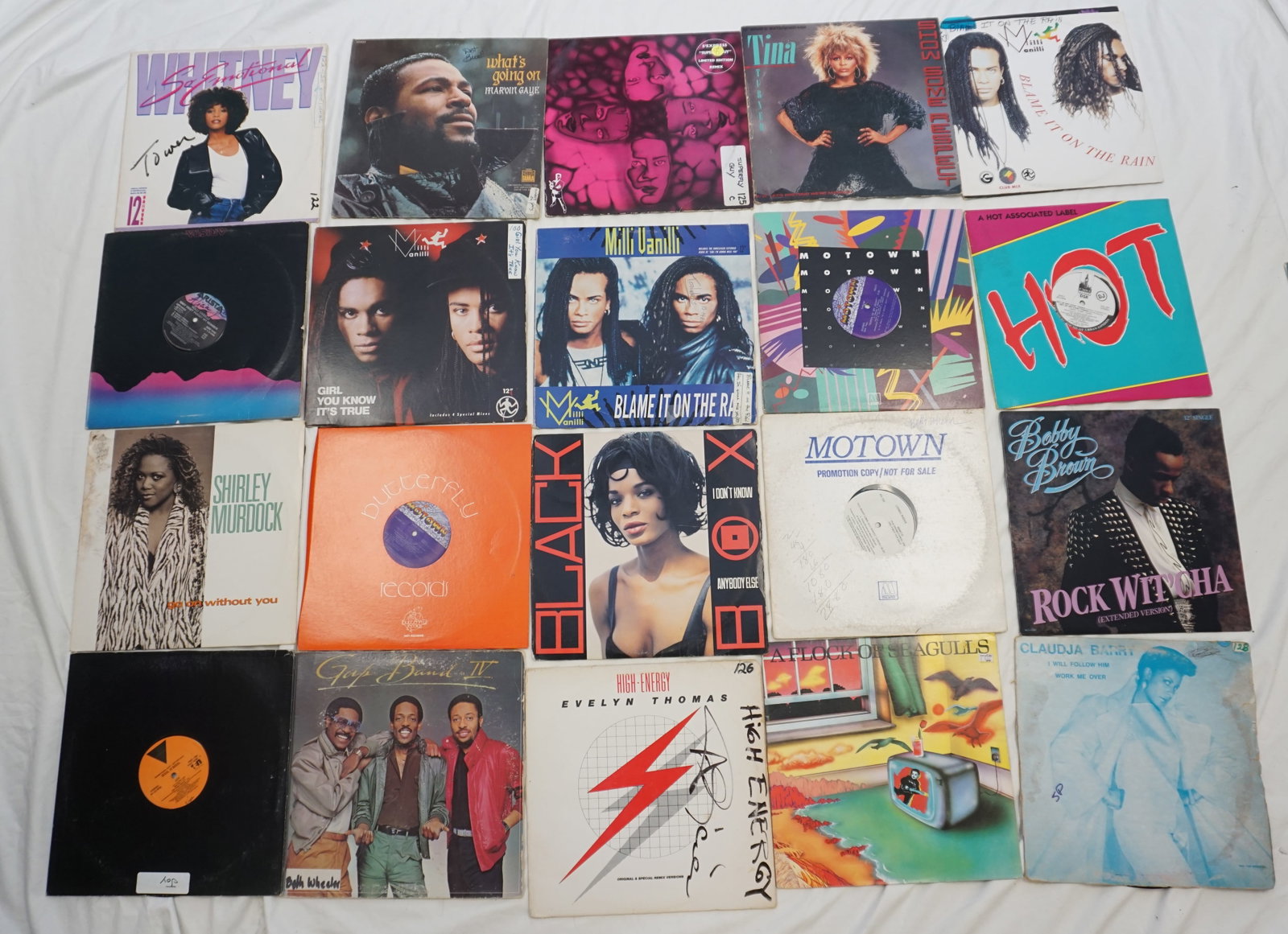 COLLECTION VINTAGE RECORDS: Focused on R&B and pop from the late 1980s to early 1990s, this collection includes artists like Sheryl Lee Ralph and Milli Vanilli. The records represent a period of transition in music, with vibrant