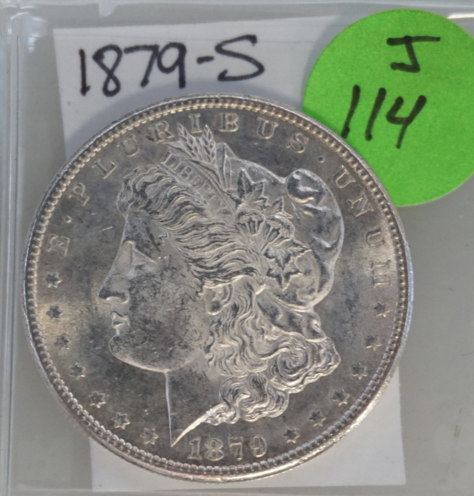 1879-S MORGAN SILVER DOLLAR- GEM BU - UNGRADED: The 1879-S Morgan Silver Dollar, in GEM BU condition but ungraded, represents the pinnacle of San Frances co Mint craftsmanship. This coin features exceptional luster and sharp details, with Lady Libe