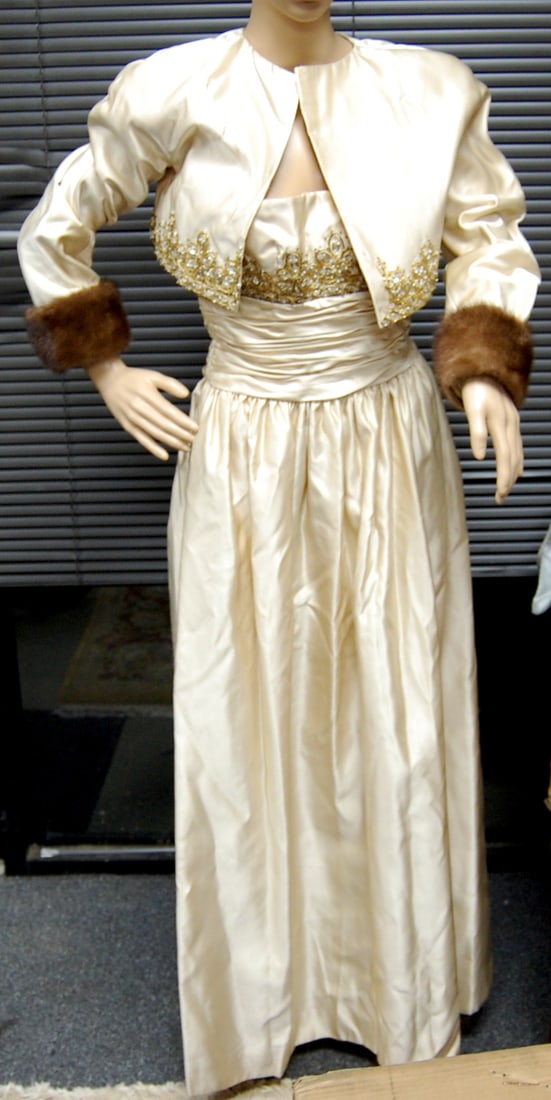 VINTAGE VICTORIA ROAY DRESS AND COAT: This vintage Victoria Royal size 6 dress and short coat set exudes timeless elegance. The ivory-colored satin fabric is embellished with gold embroidery and beadwork along the bodice and coat, while t