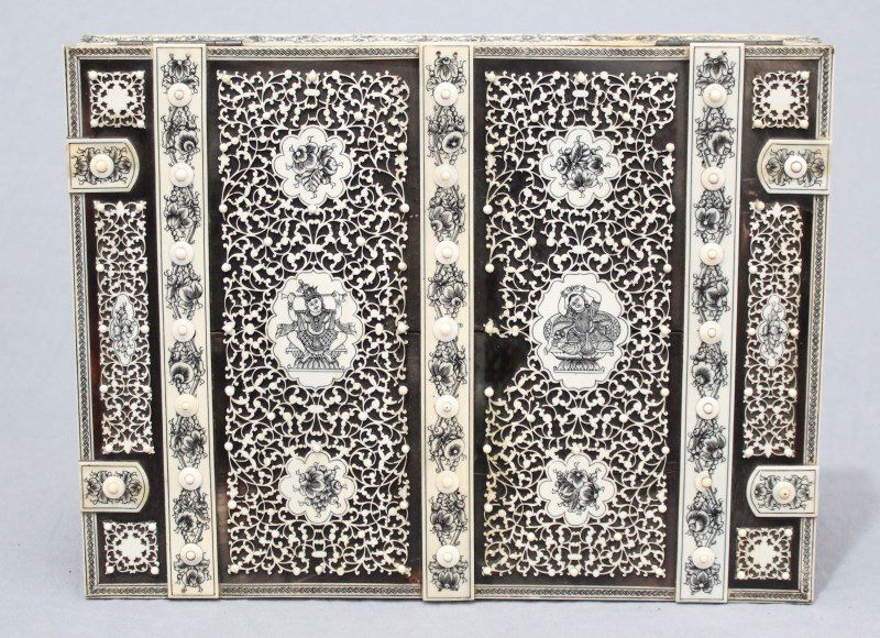 19th c ANGLO INDIAN VIZAGAPATAM ORNATE IVORY BOOK COVER: Antique Anglo Indian Vizagapatam 19th Century Sandalwood, Ebony and Ivory Etched Book Cover. Exceptionally fine, the wood with intricate mounted cutwork ivory with engraved figural medallions, ornate