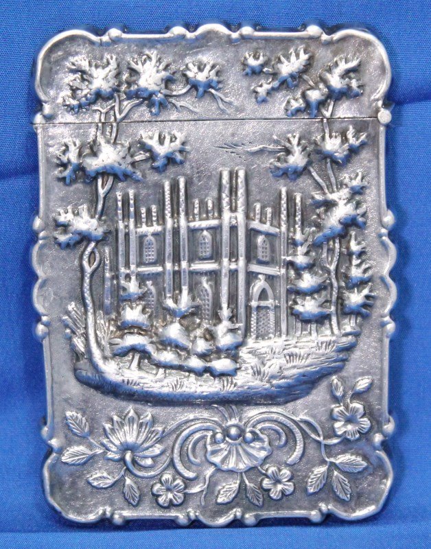 ANTIQUE 19th c LEONARD & WILSON COIN SILVER CARD CASE: Ornate Antique c. 1850 Card Case having finely detailed chased and repousse images of historical gothic architecture to the reverse and the obverse with ornate high relief florals and scrolls, monogra